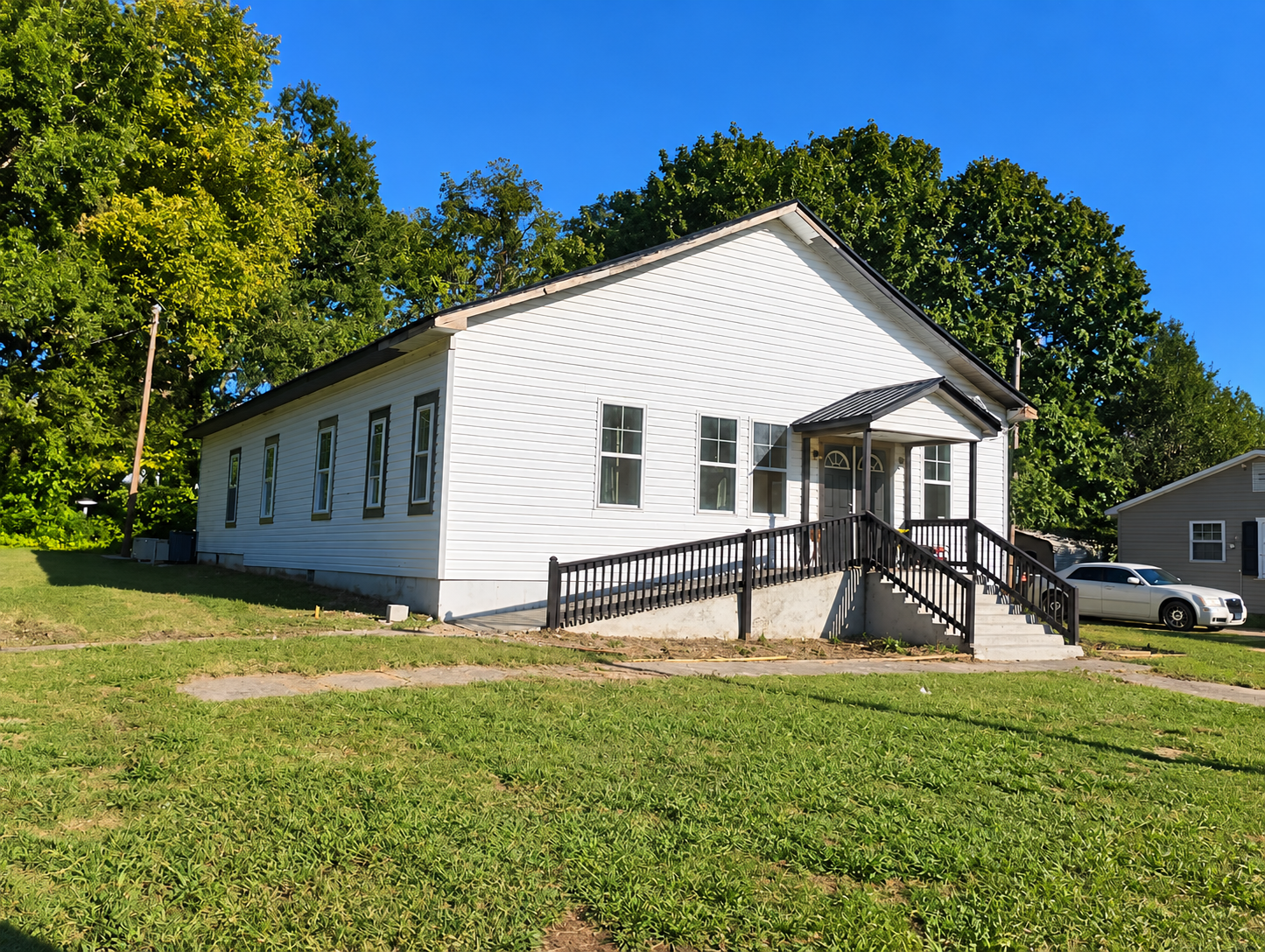 Three-quarter perspective view of the Serenity Homes property in Statesville, NC