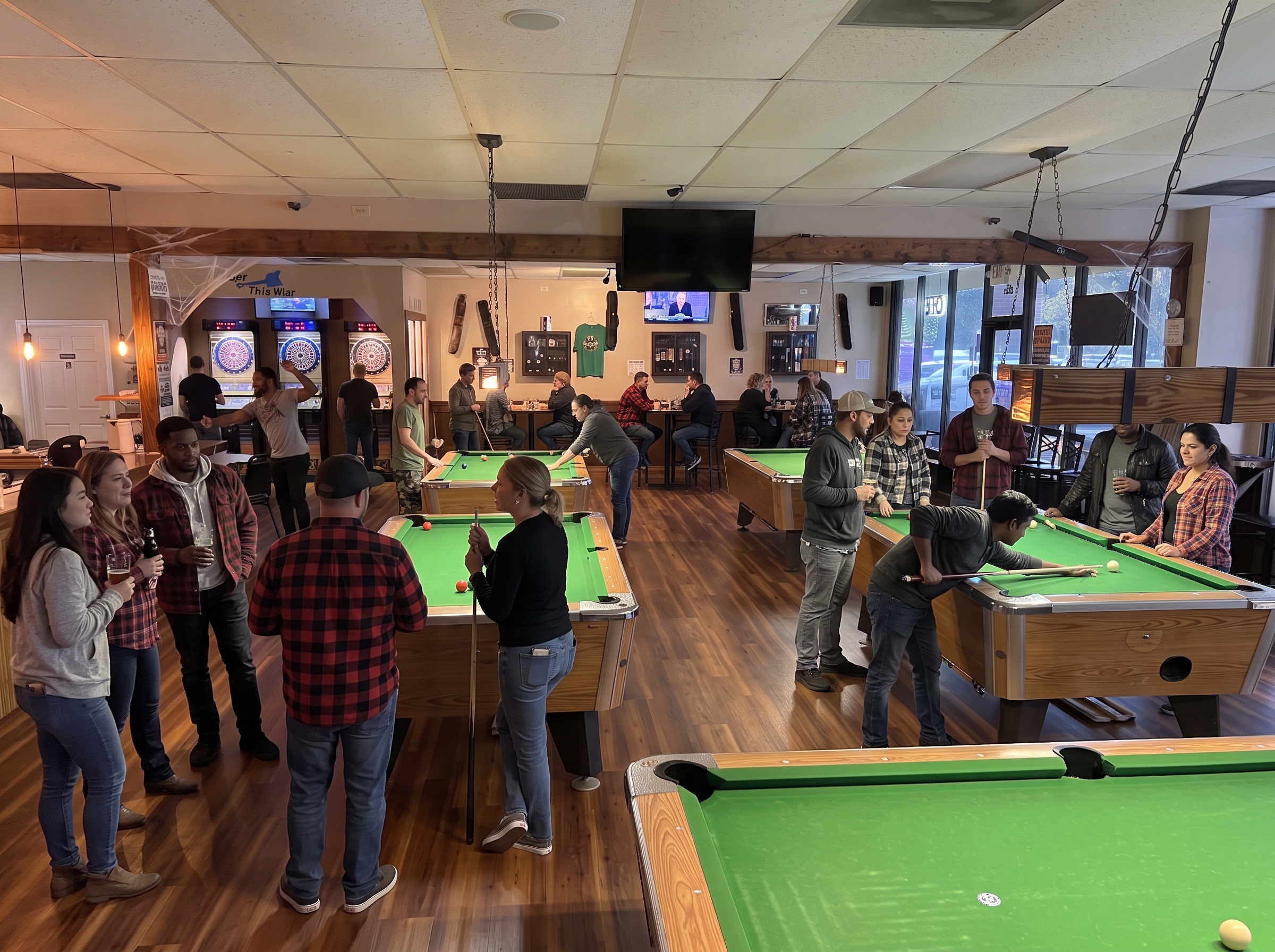 On Cue Billiards room with 6 regulation green felt tables and bar