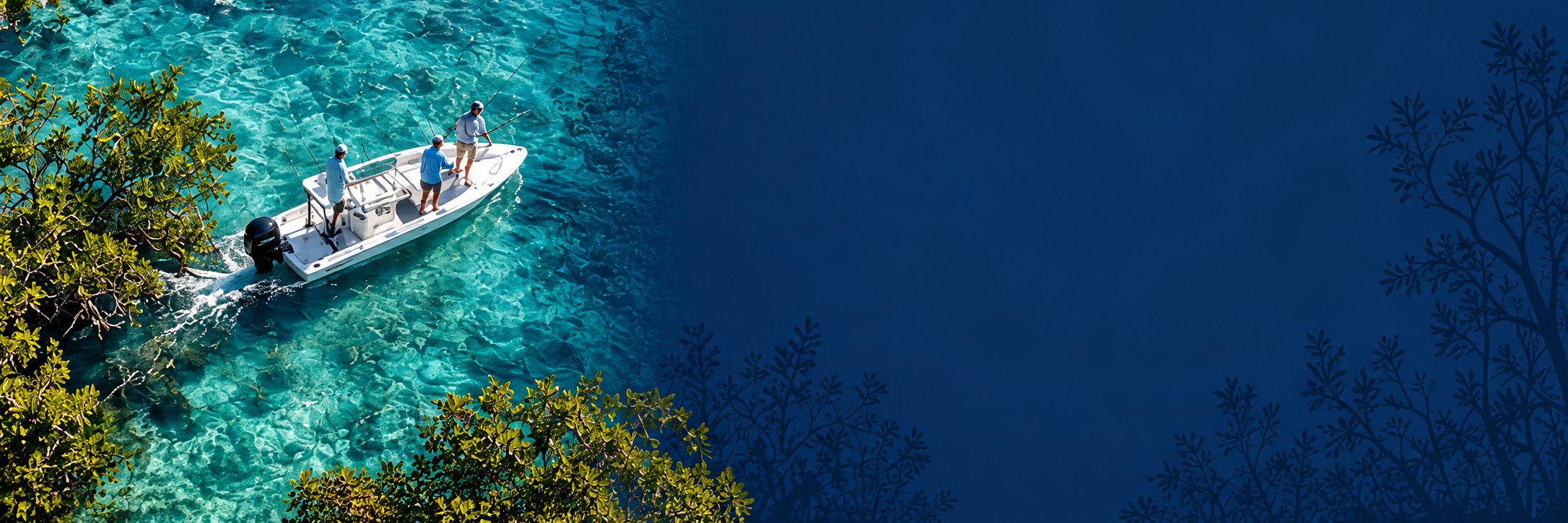 Aerial view of a family fishing boat cruising crystal turquoise South Florida shallows