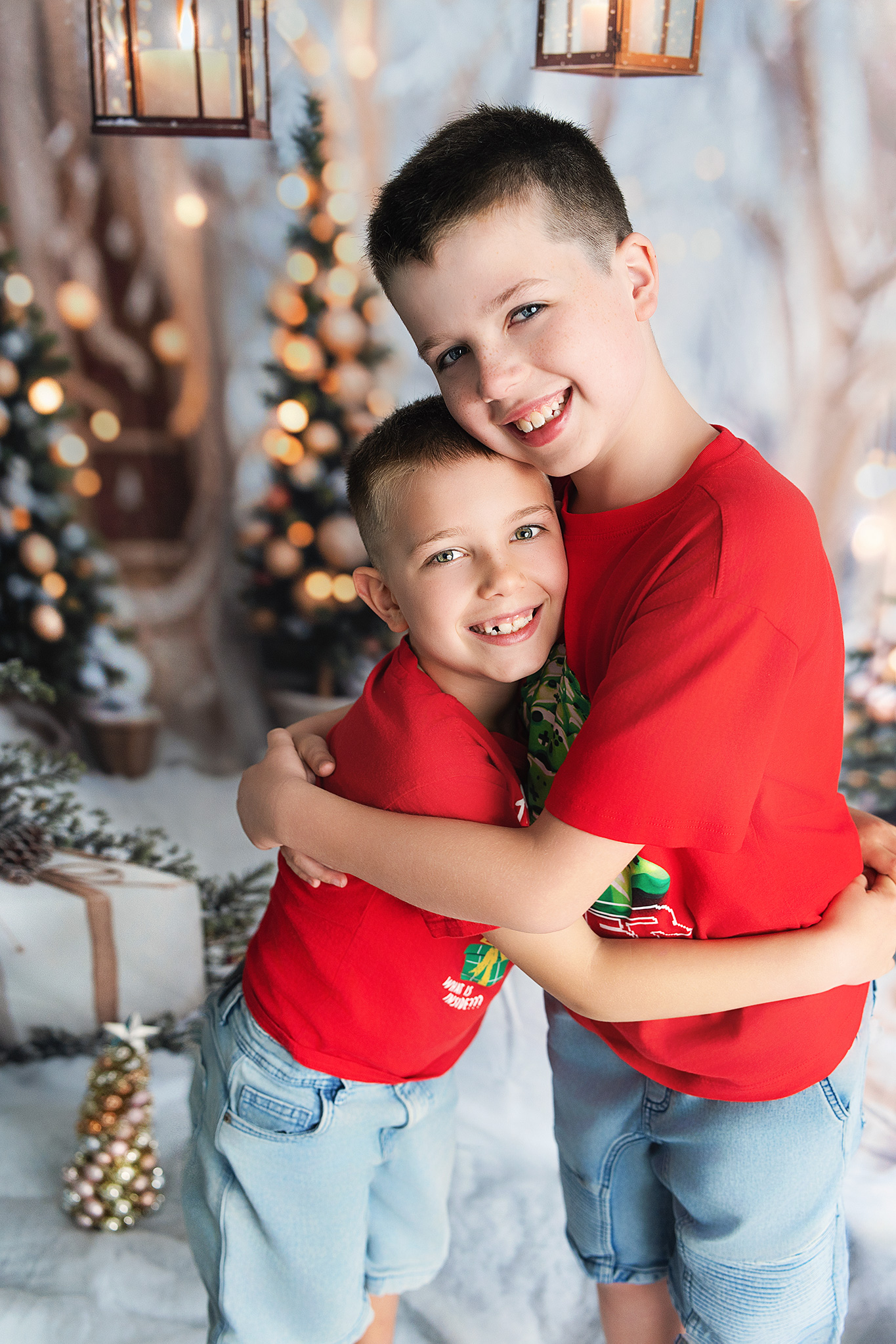 Two brothers warmly embracing with glowing lantern background