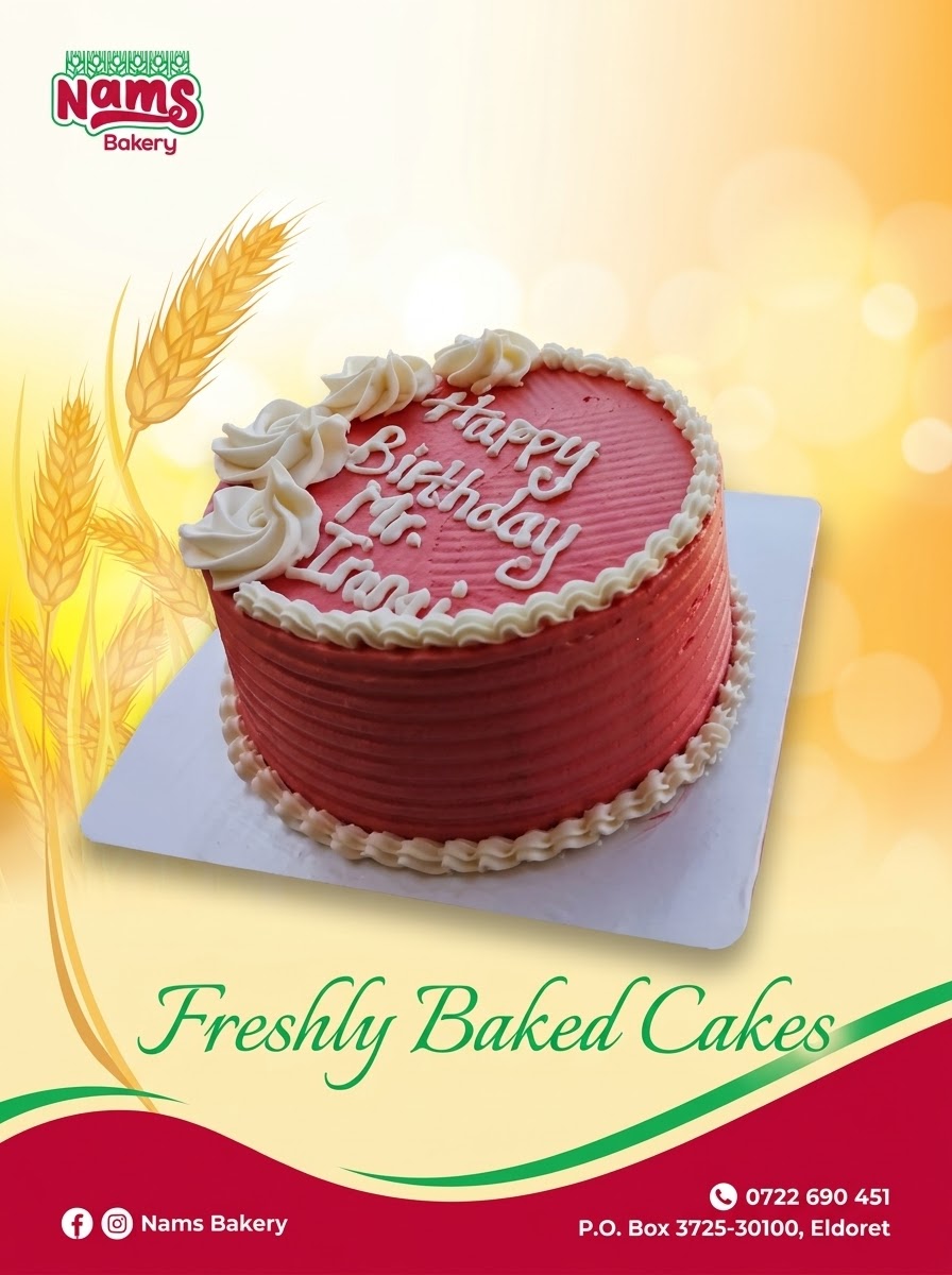 Nams Bakery red birthday cake with white rosettes and custom inscription.