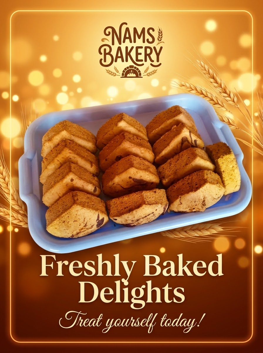 A blue tray filled with golden freshly baked Nams Bakery delight slices.