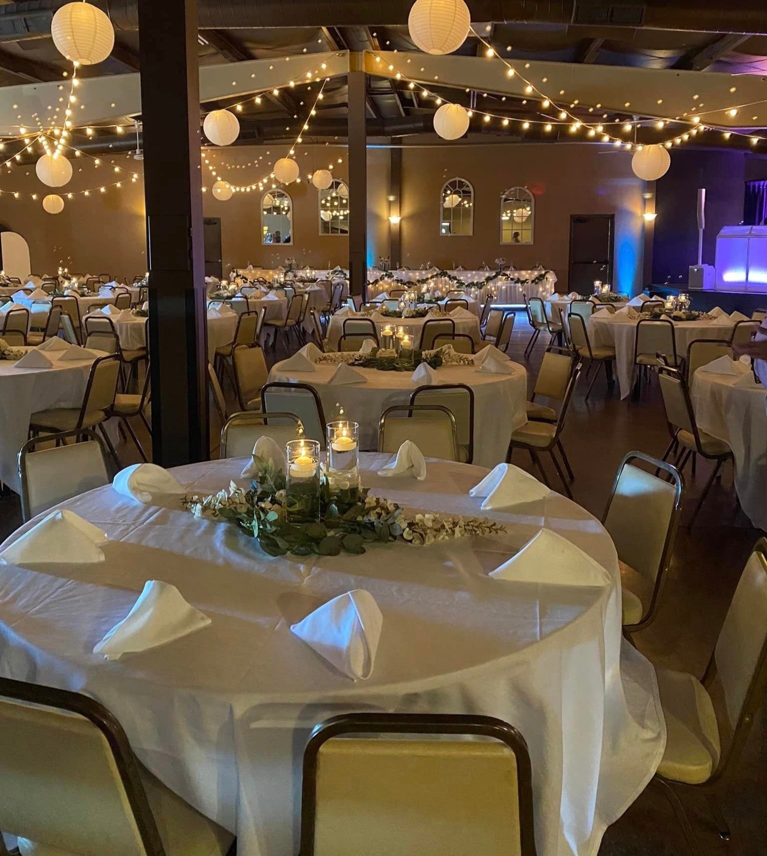 Havelock Social Hall awards banquet with stage and lighted backdrop in Lincoln, NE