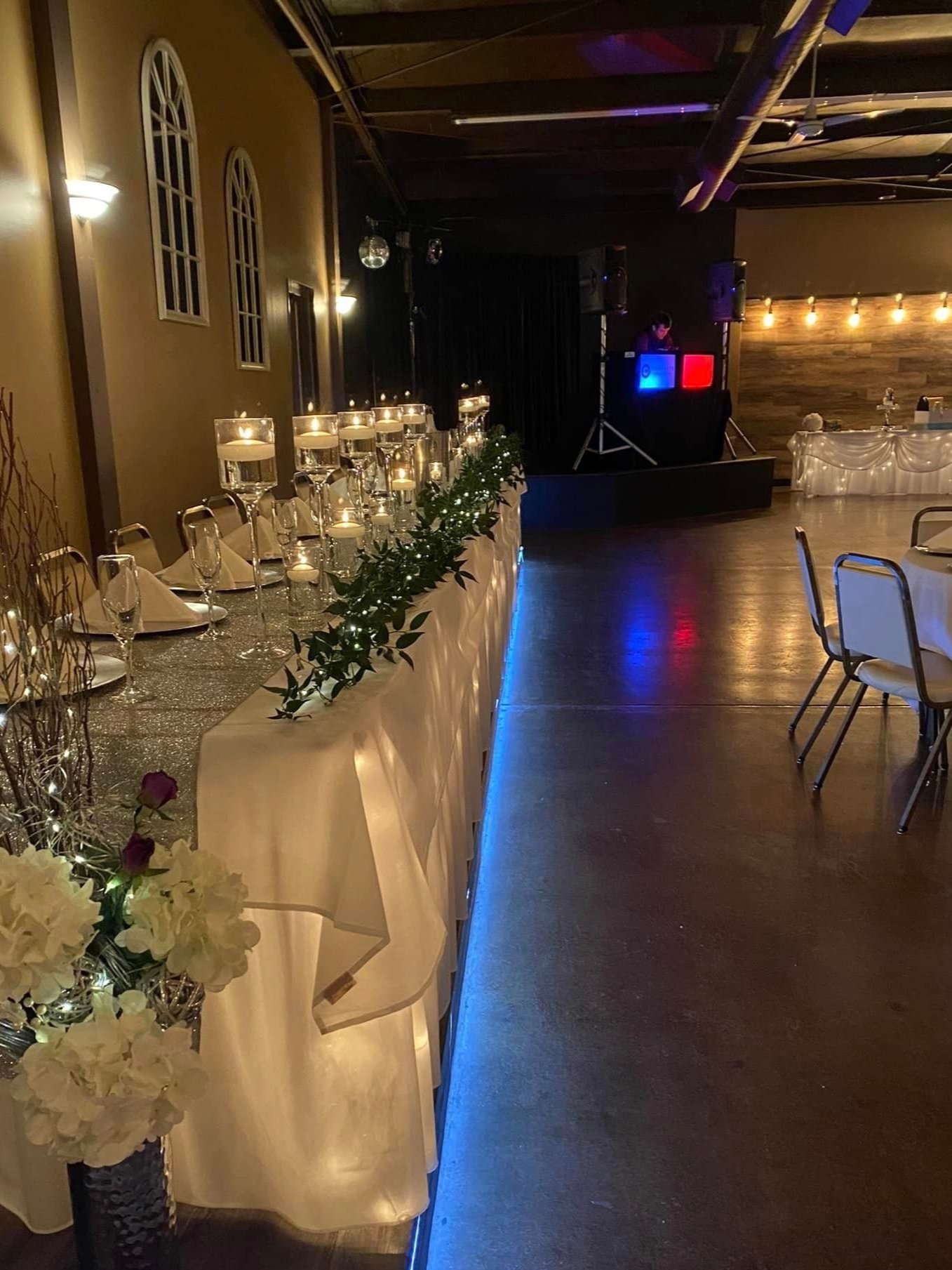 Lincoln Room dance floor, DJ equipment, and warm evening lighting