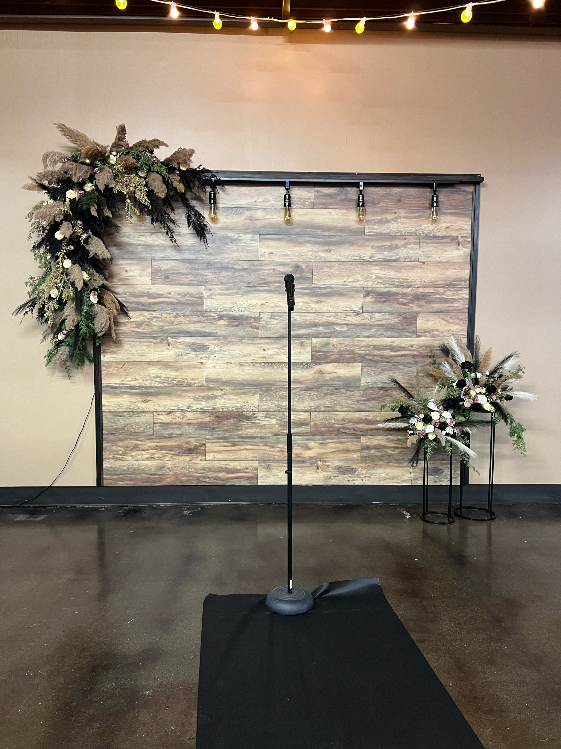 Havelock Social Hall meeting setup with stage and backdrop in Lincoln, NE