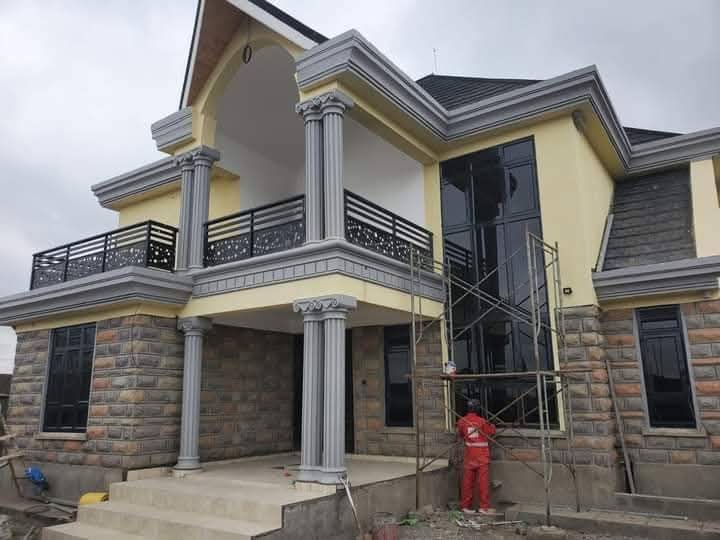 Modern Double-Storey Residence with Classical Portico