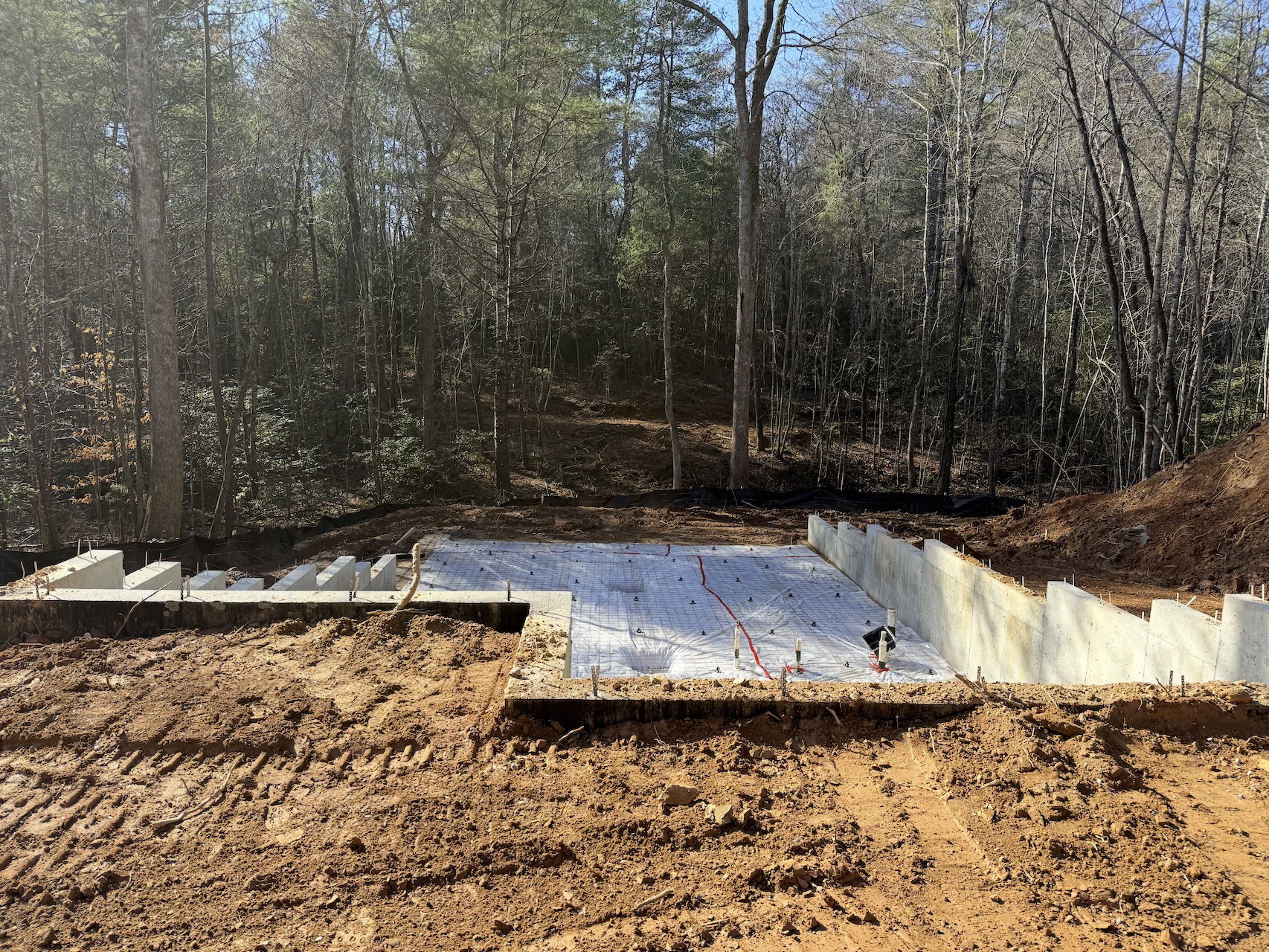 Concrete foundation walls poured on lot