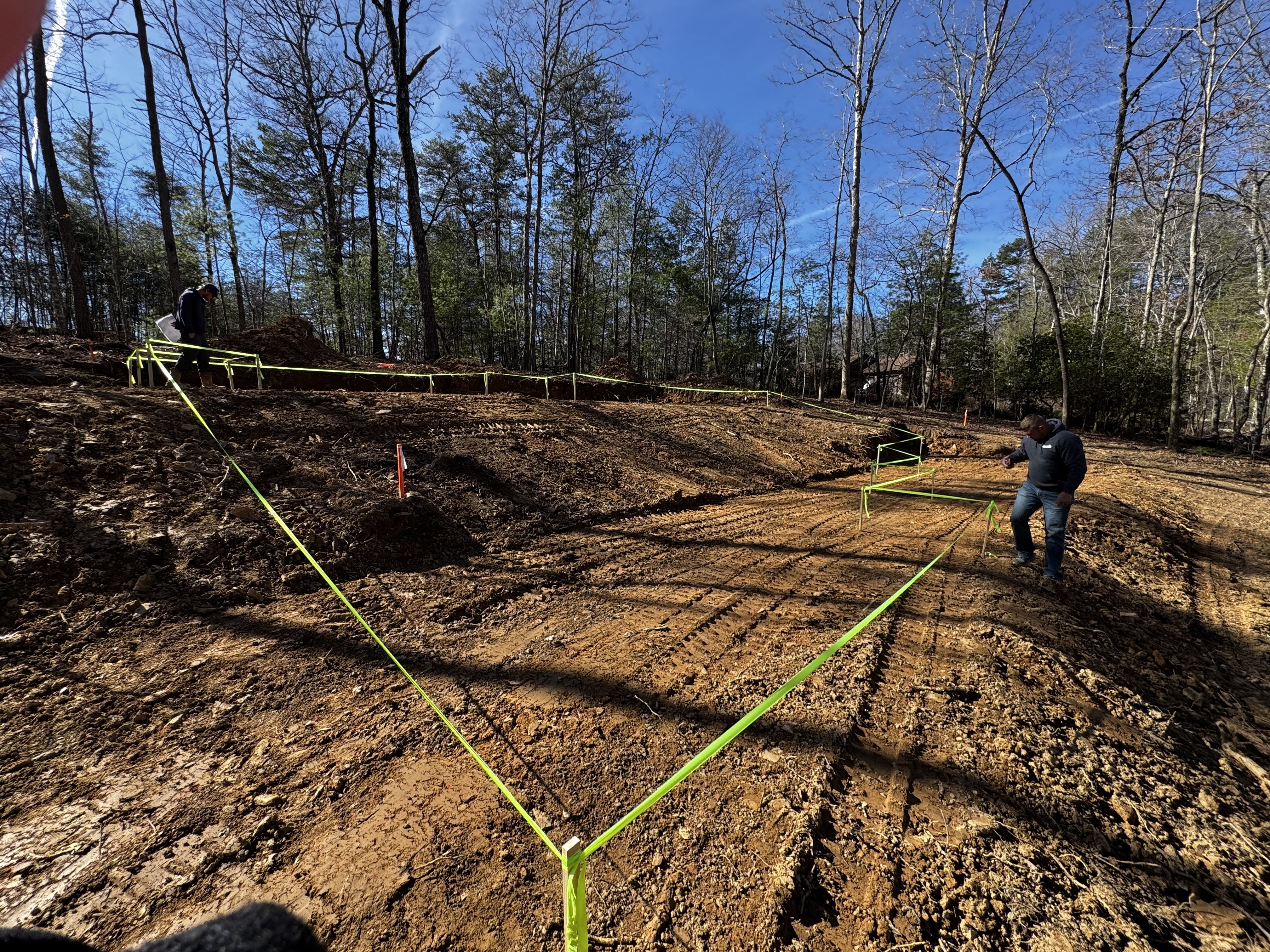 Site preparation and land grading with layout tape