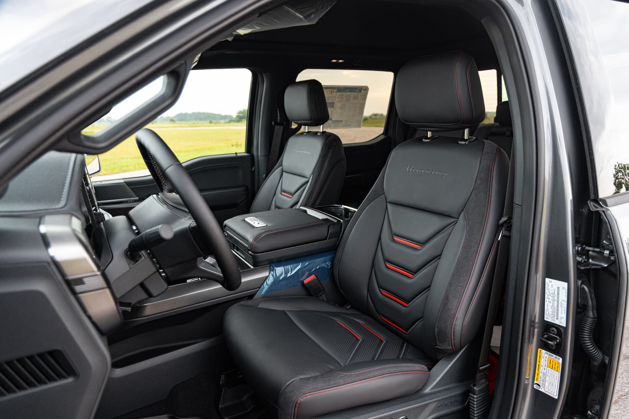 Custom leather interior & headrest embroidery