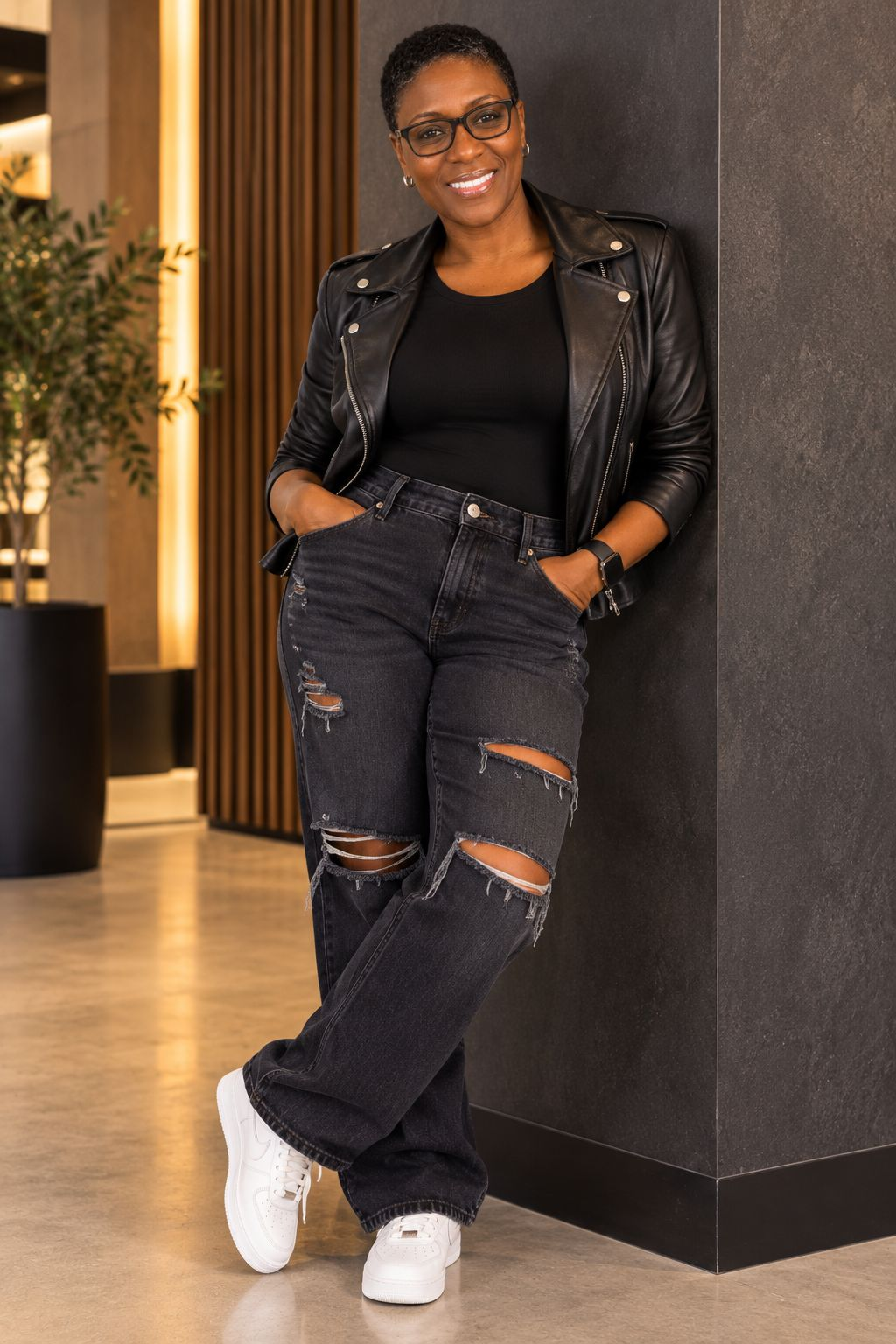 Mekka in a leather jacket, confident