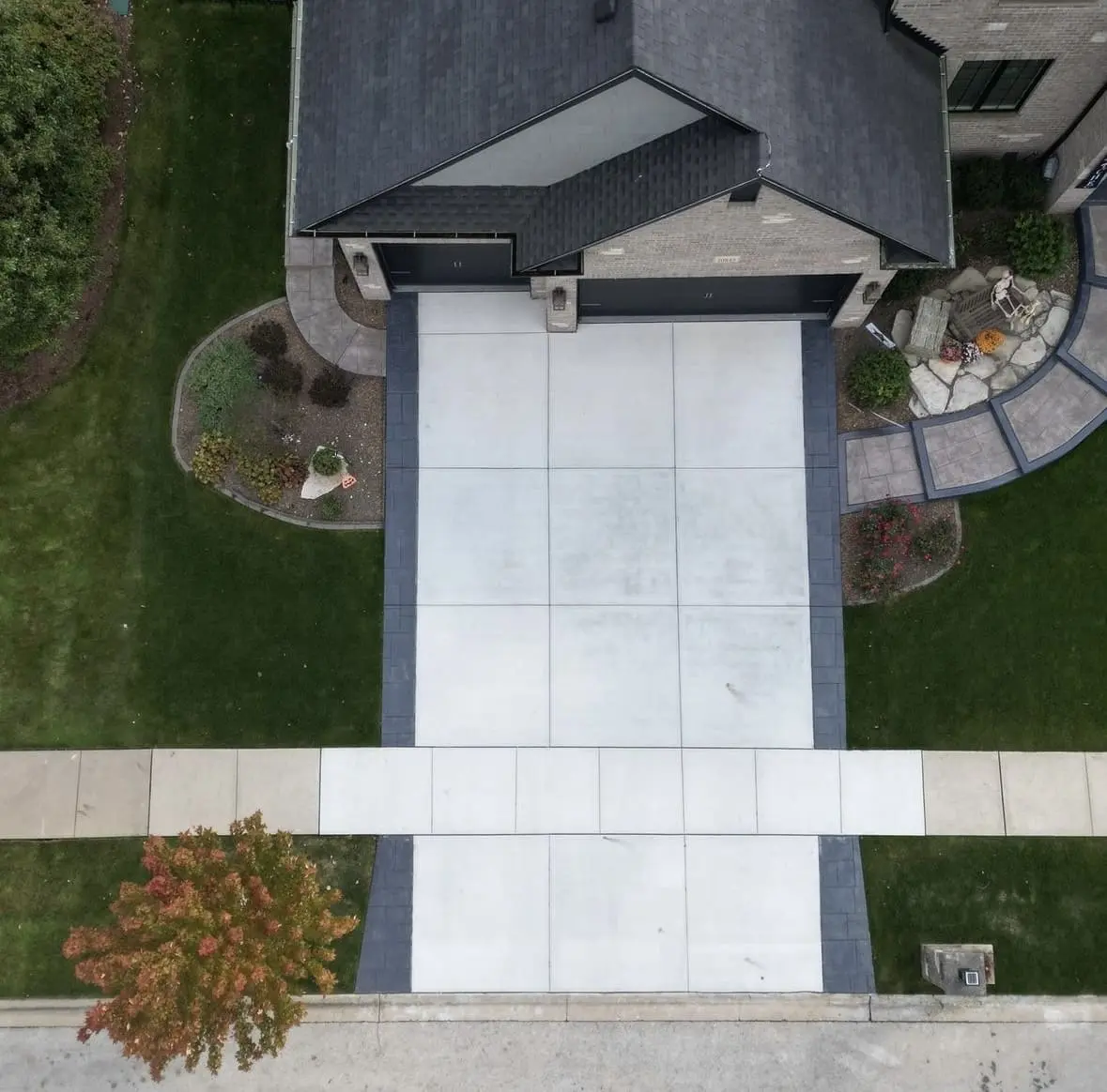 Carmel Broom Driveway with Stamped Charcoal Borders