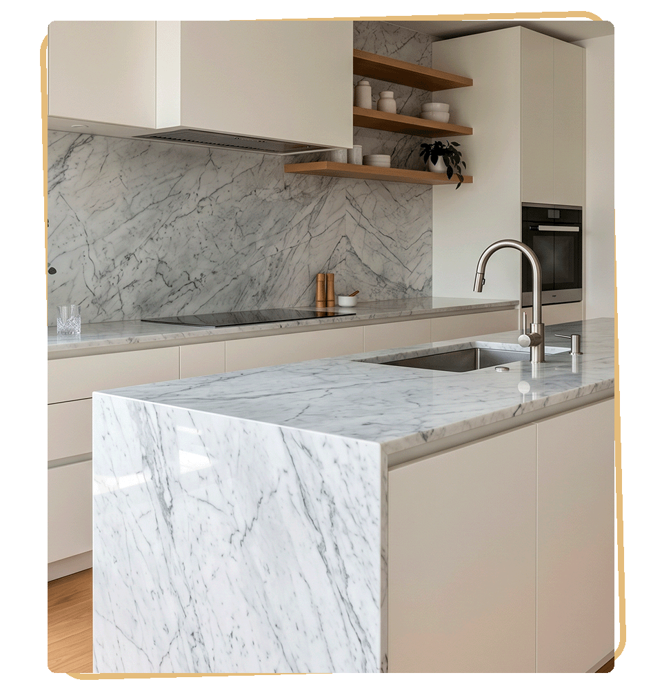 Calacatta quartz waterfall kitchen island fabricated and installed by KCC