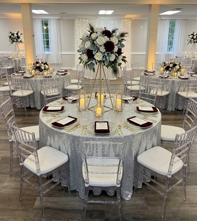 Elegant dinner table setup with floral centerpiece at The LayR Event Venue