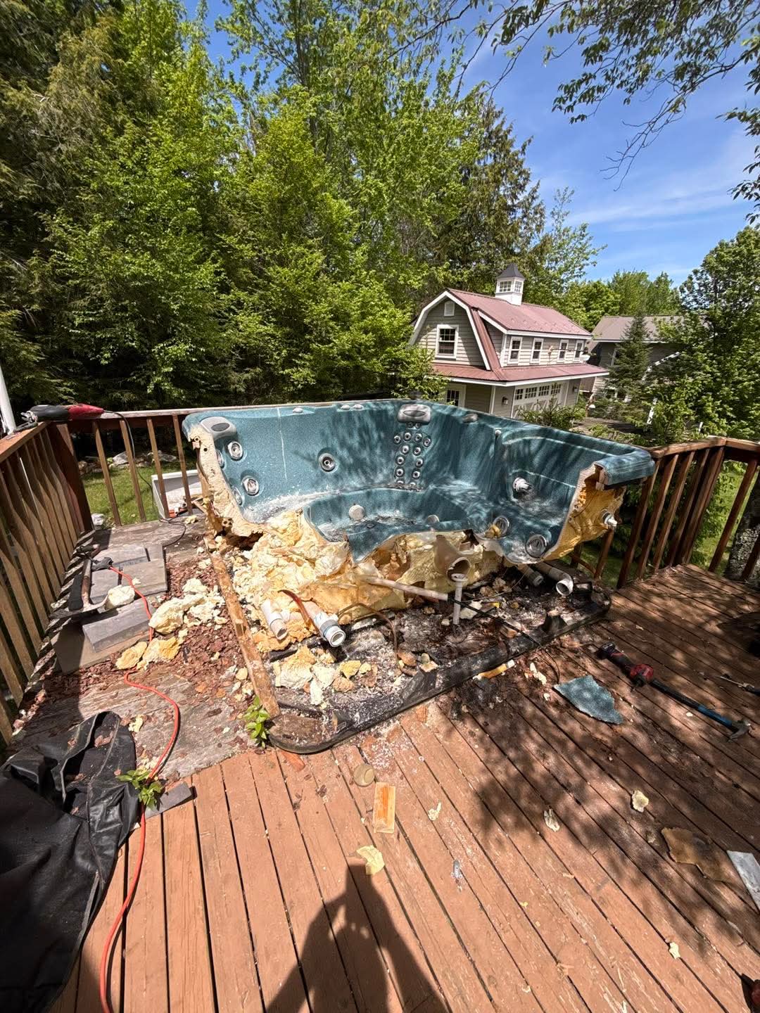 Before: Hot tub / pool on deck before removal