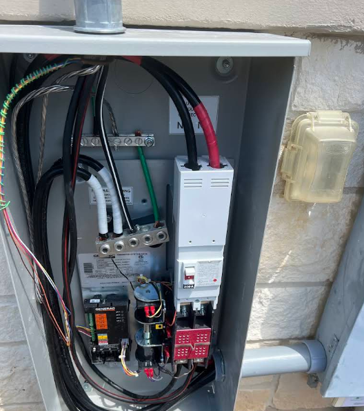 Exterior 200A electrical service disconnect and automatic transfer switch enclosure installation