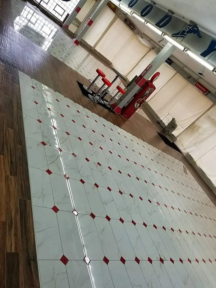 High-Gloss Marble Floor with Ruby Inlays & Wood Accent