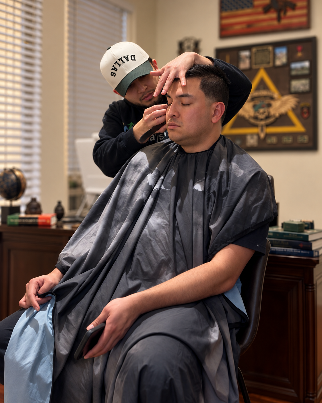 Omar Elattar receiving private barbering service at a residential location in Dallas