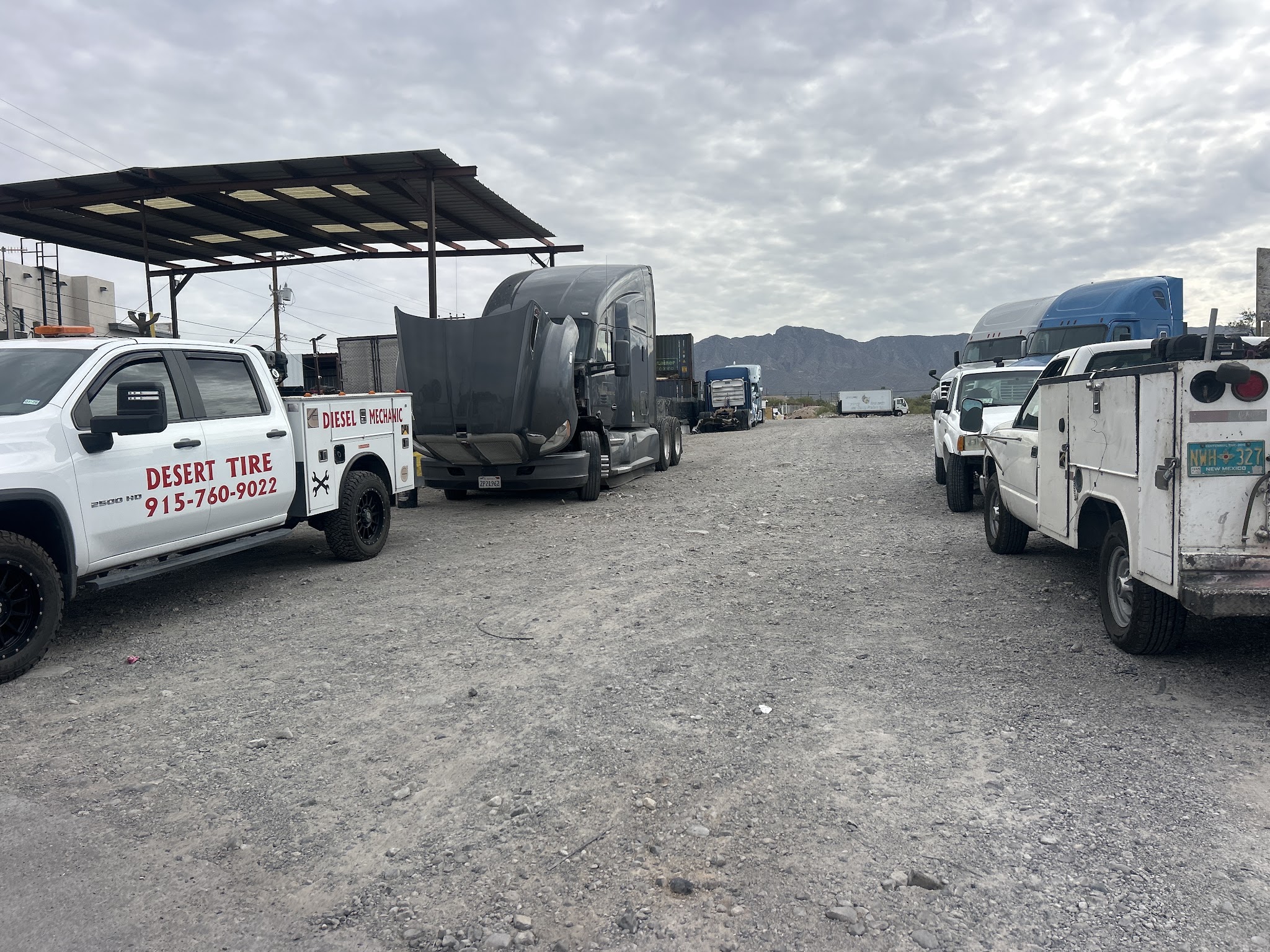 Desert Tire & Diesel service fleet beside canopy in Canutillo, TX