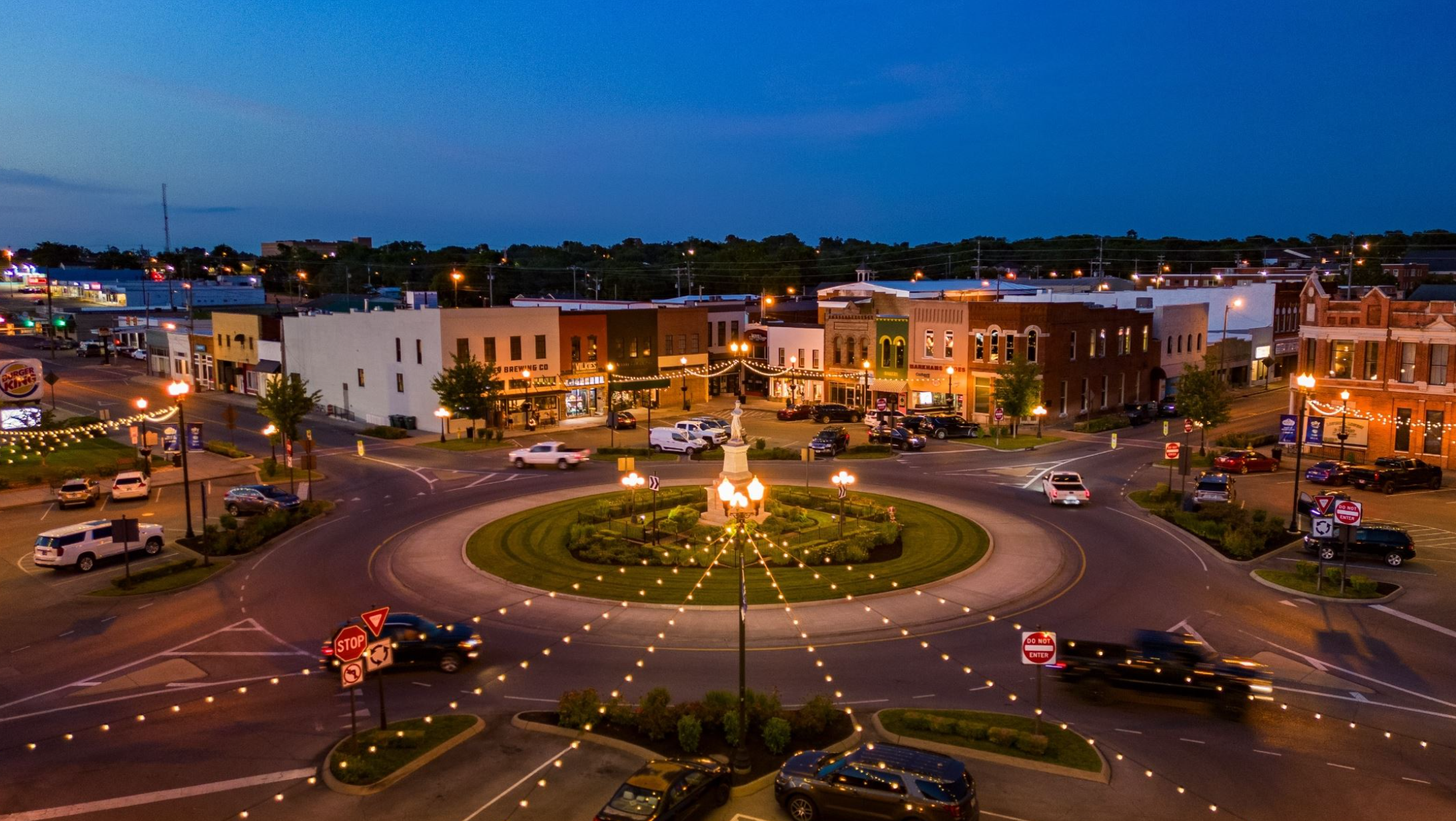 Historic Lebanon Square roundabout at dusk with string lights
