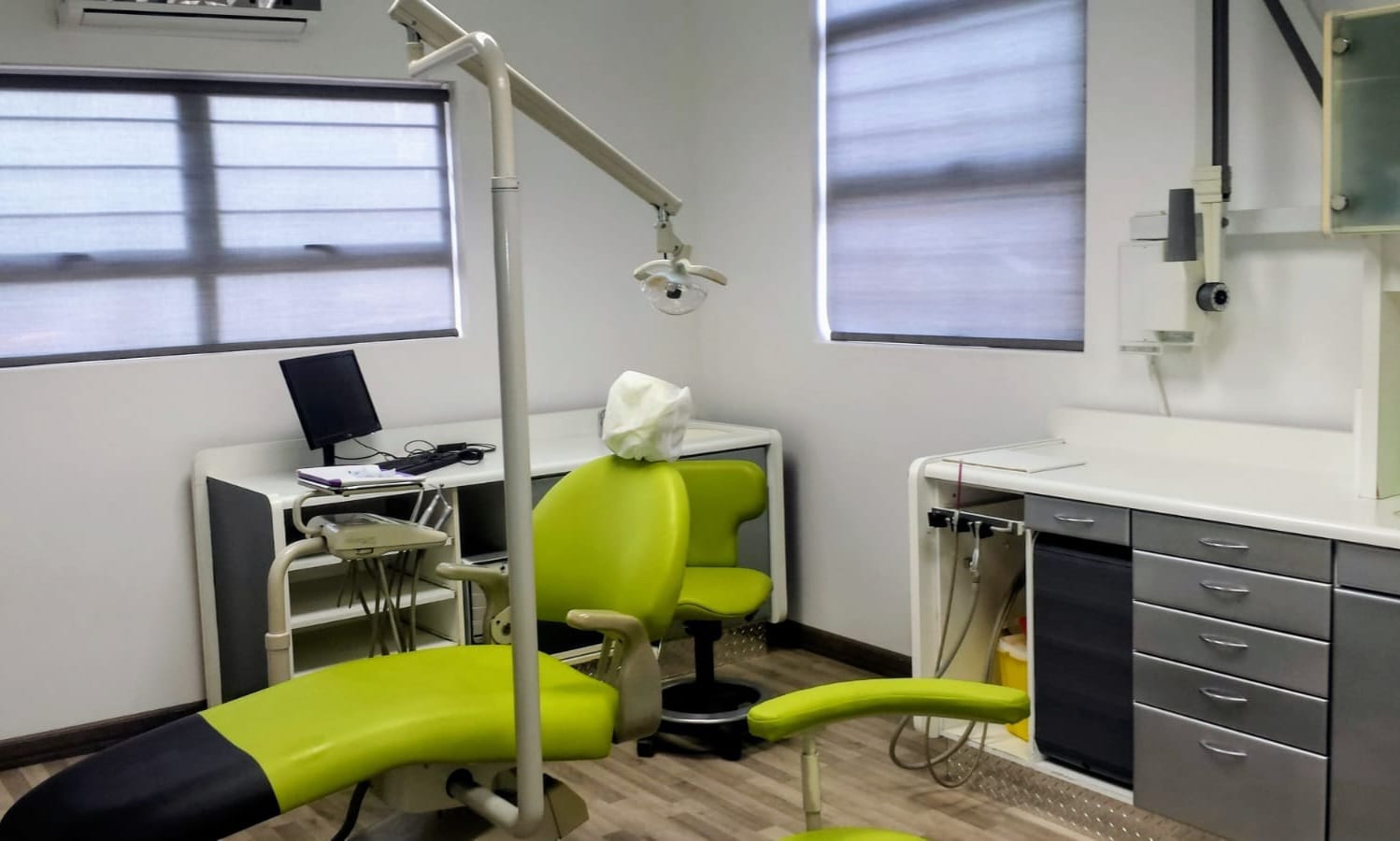 Dental surgery suite with treatment chair and operatory cabinetry