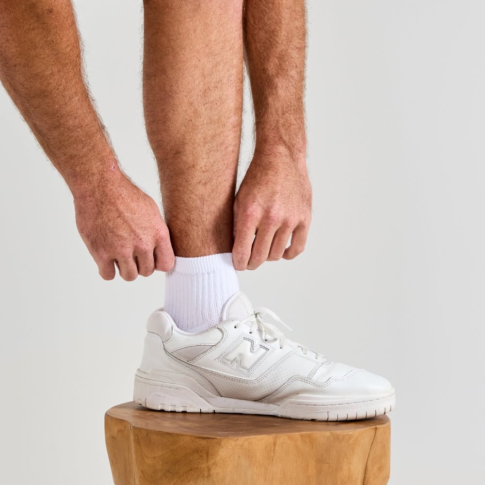 Del Campo golf socks pack laid out on white