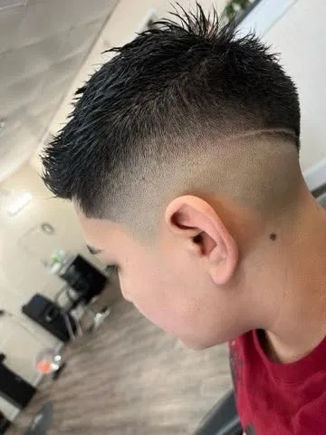 High Skin Fade with Razor Line Slash & Textured Spiky Top