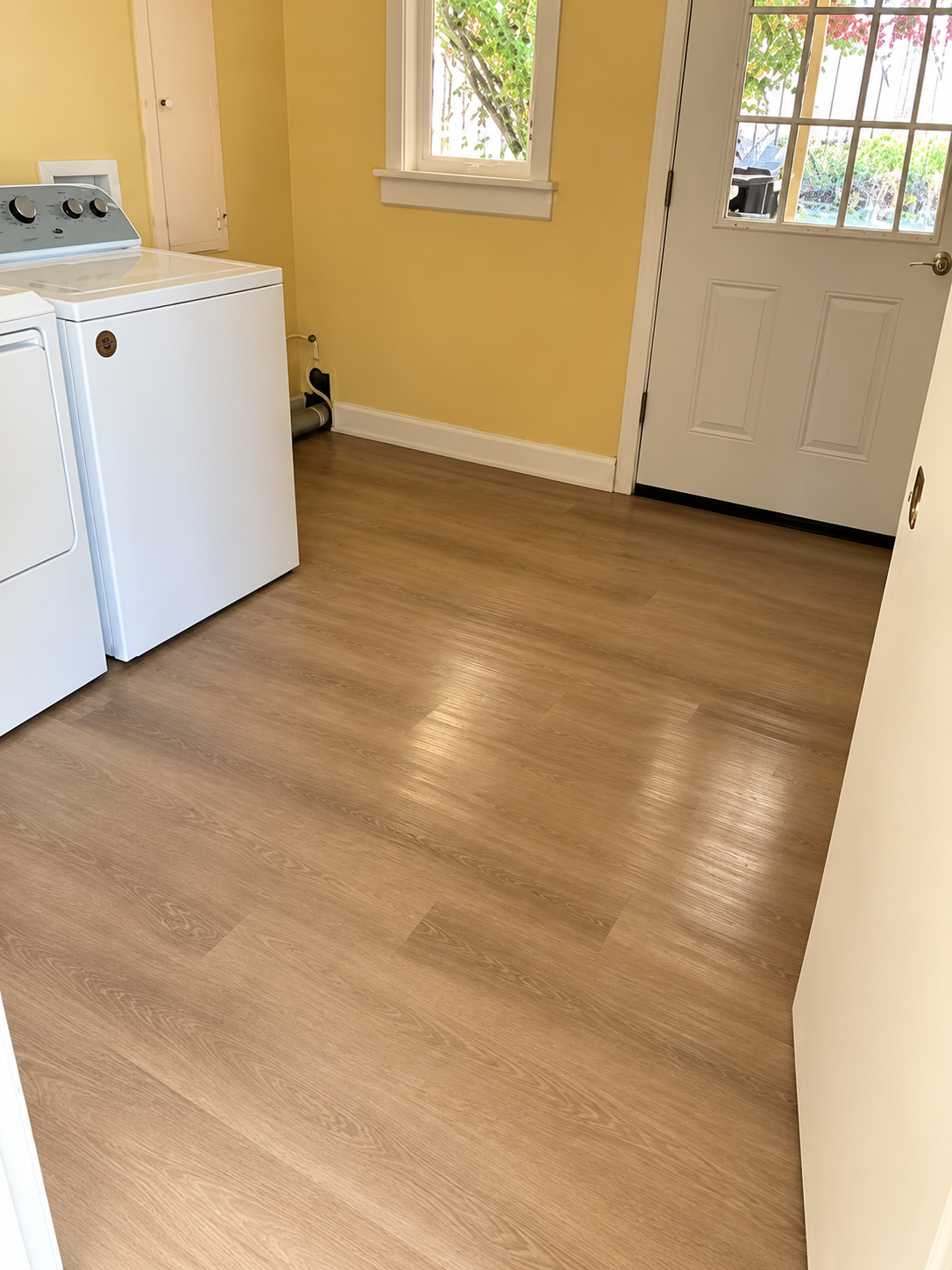Freshly Mopped Hardwood & Sunny Laundry Space