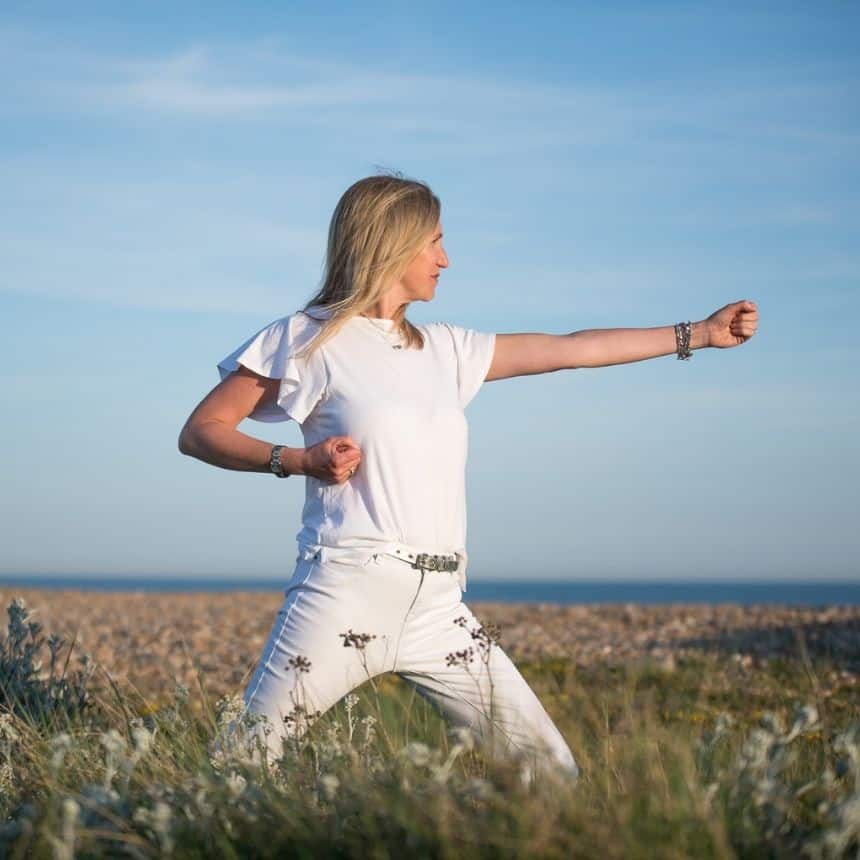 Annabel practicing Qigong Lung Move in nature
