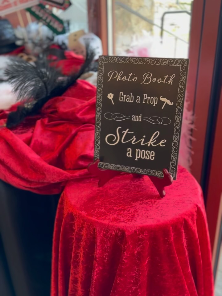 Grab a Prop and Strike a Pose table display with luxury red velvet accents