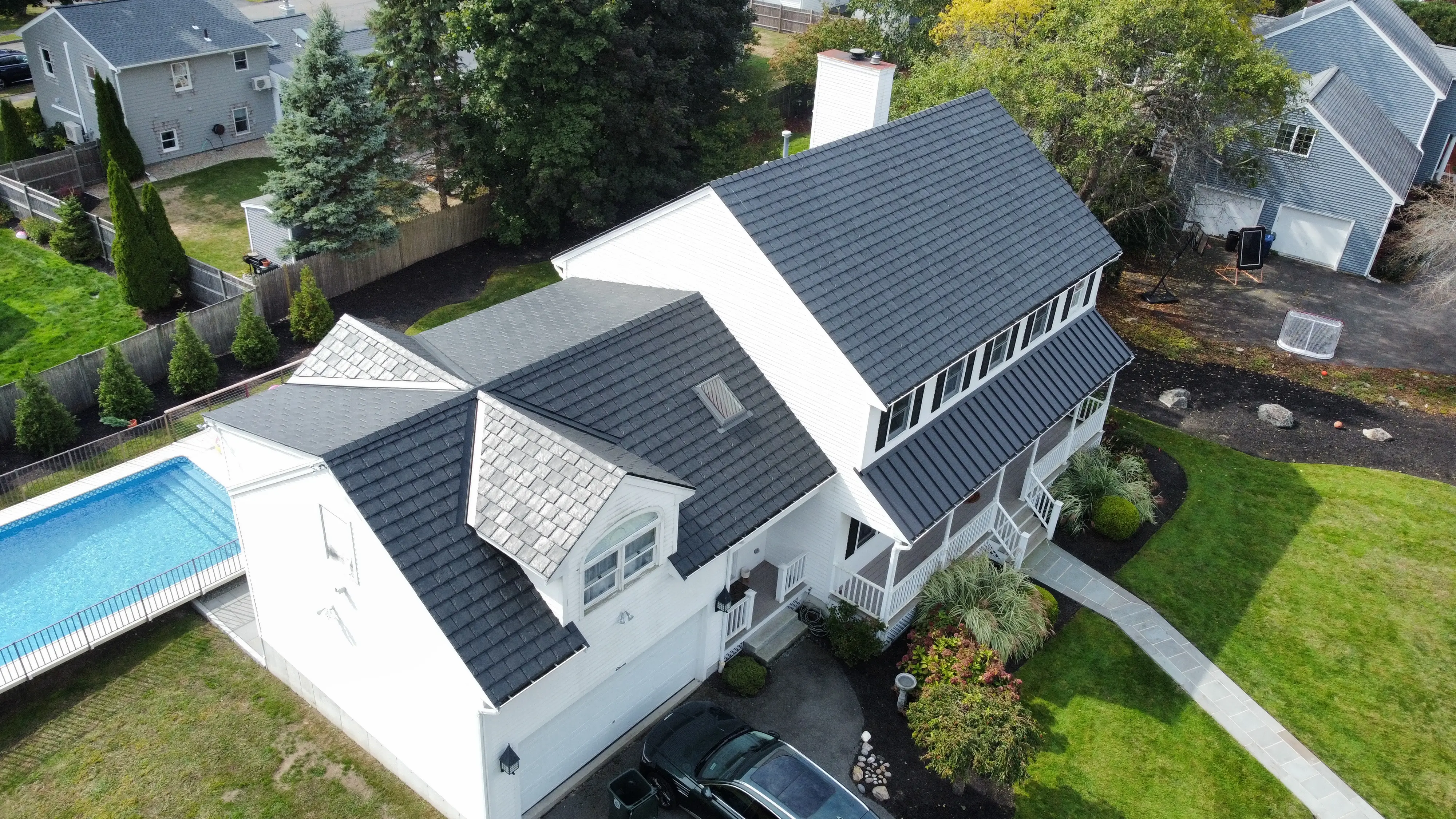 Aerial view of completed roof replacement by Over the Top Roofing
