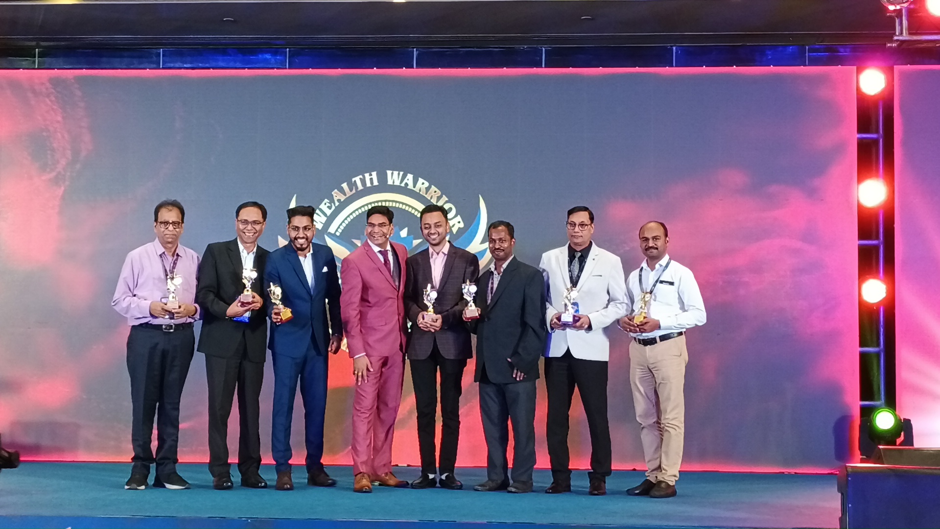 Thandavarayan M. receiving the Hall of Fame Award on stage at Wealth Warrior Retreat January 2025