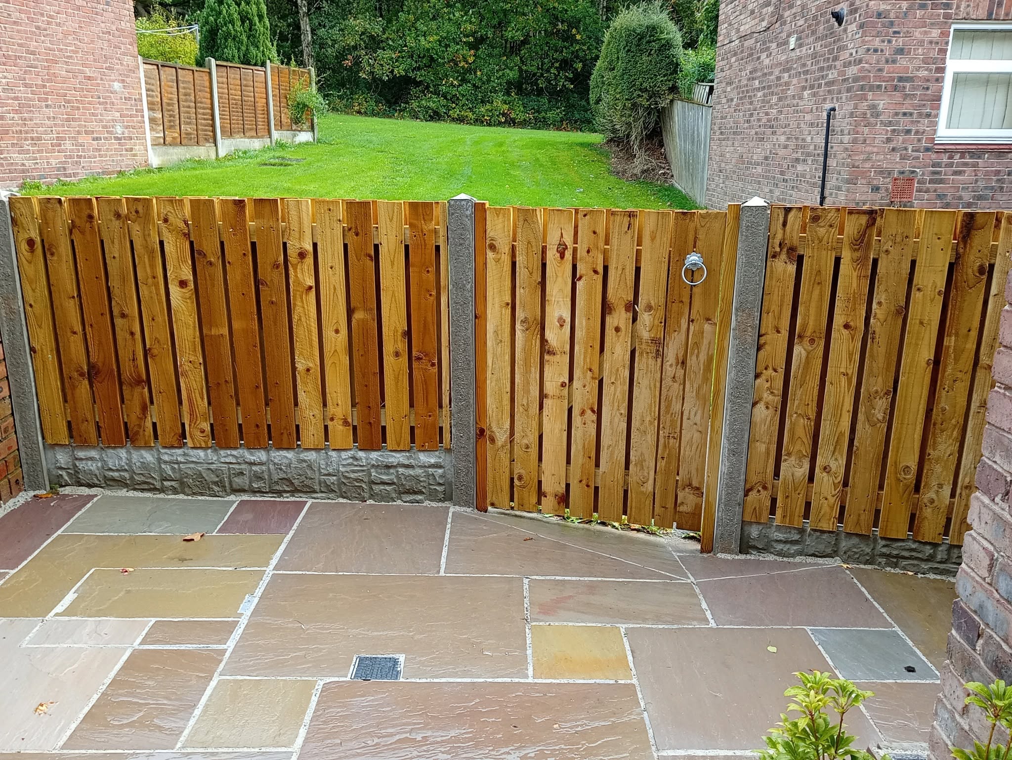 Legacy Paving stone patio with custom timber fence and gate