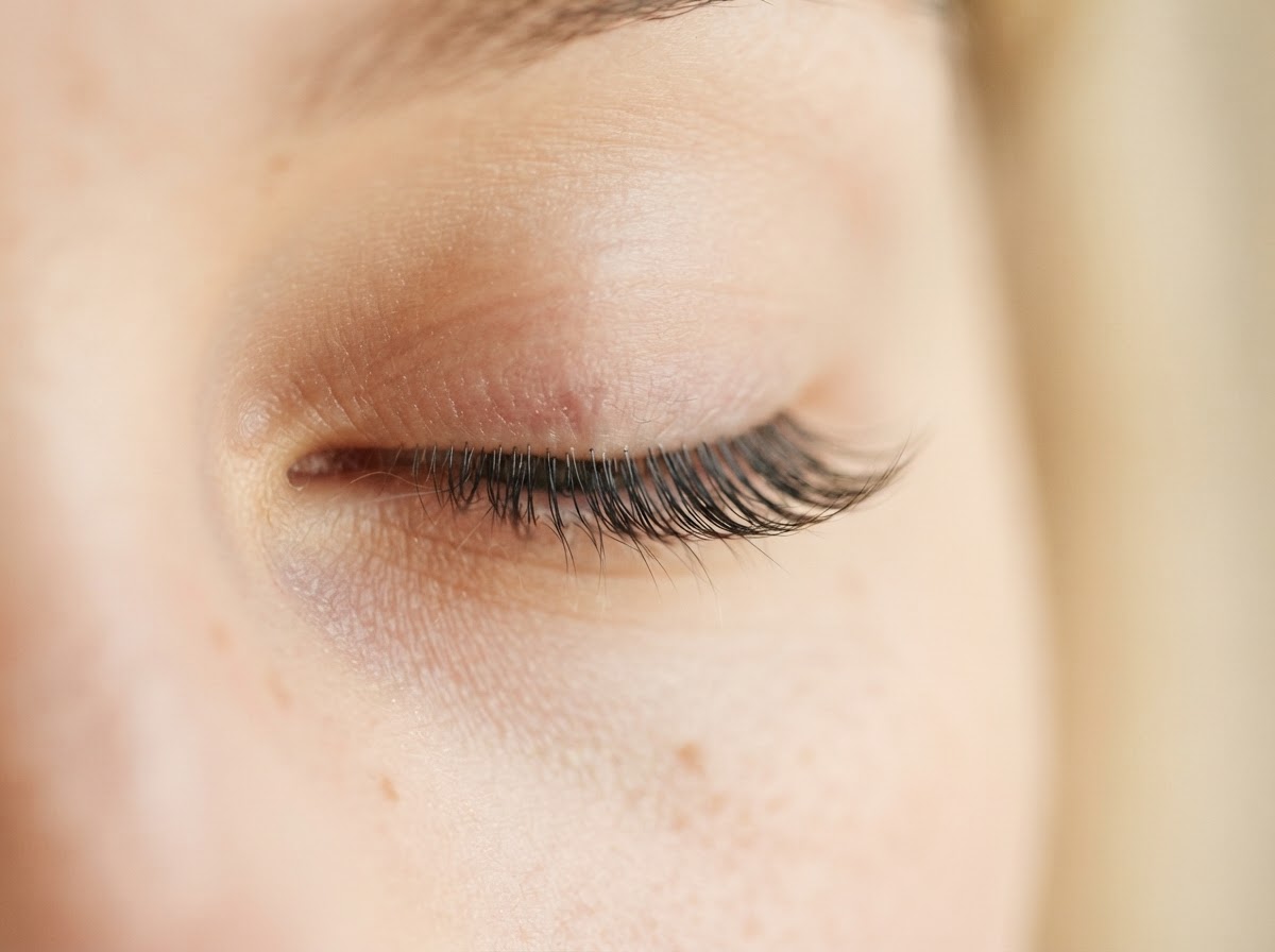 Close-up of a classic lash set, one extension per natural lash