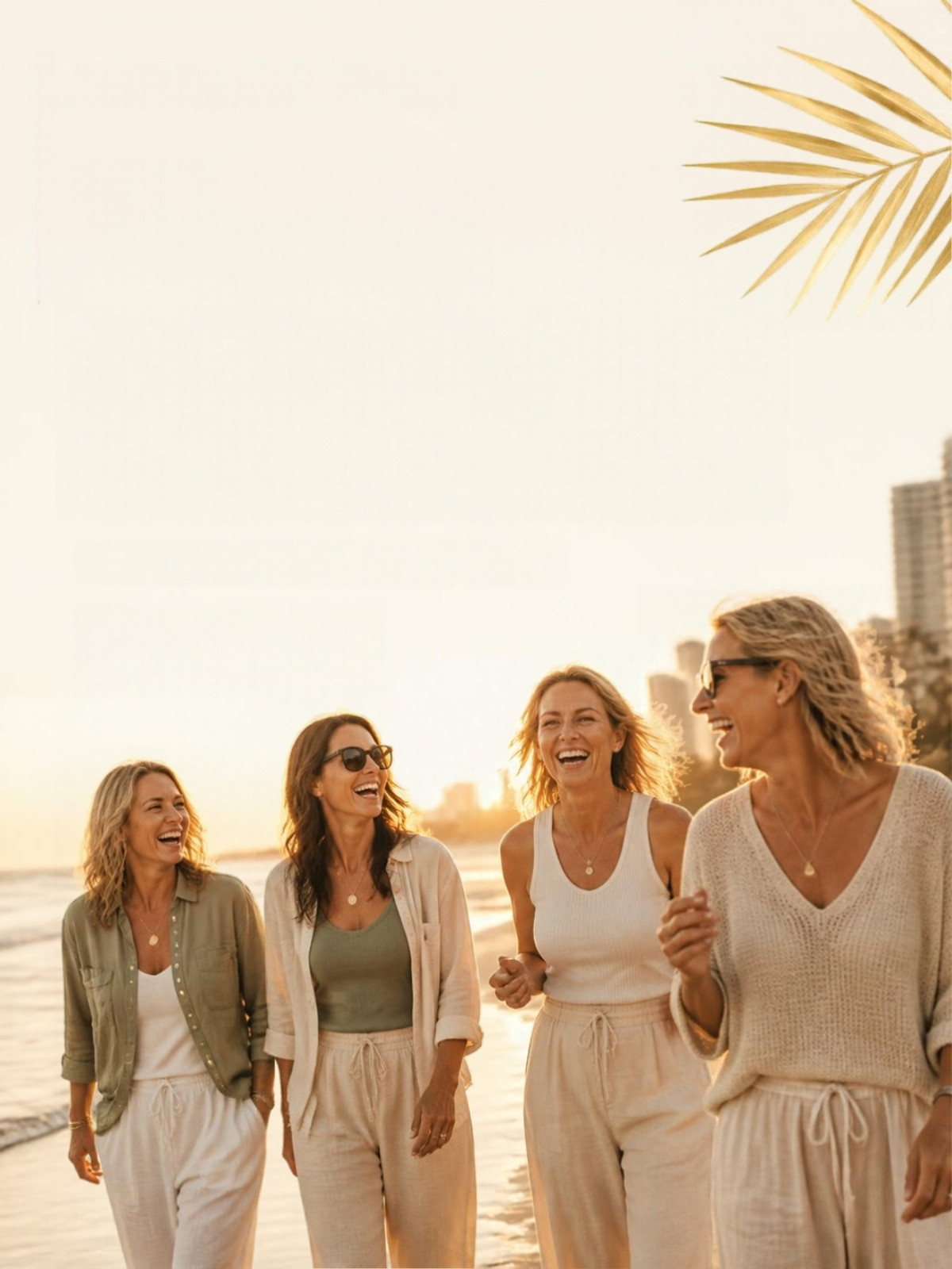 Women laughing together at golden hour