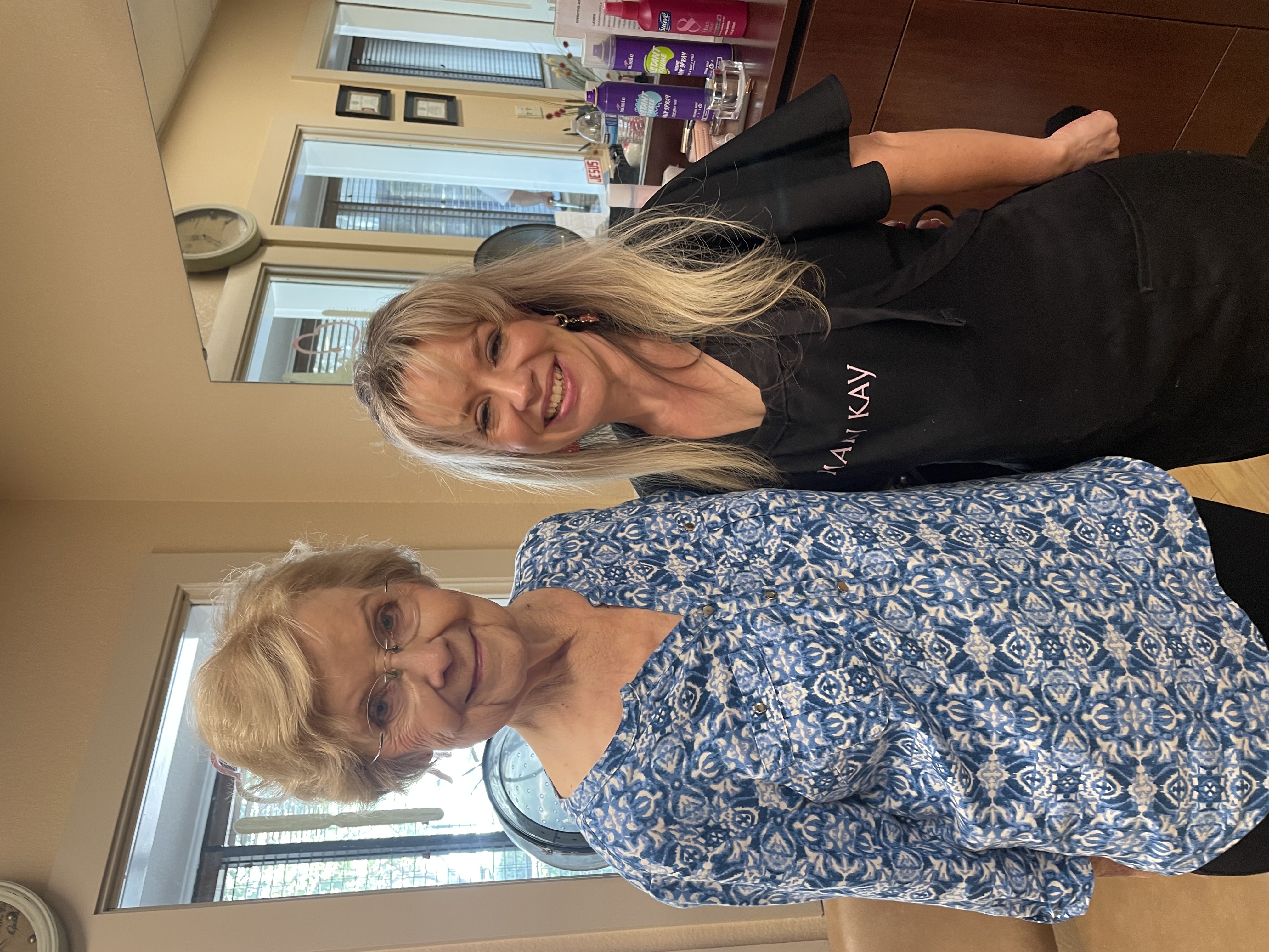 Theresa with a smiling resident after a gentle makeover session