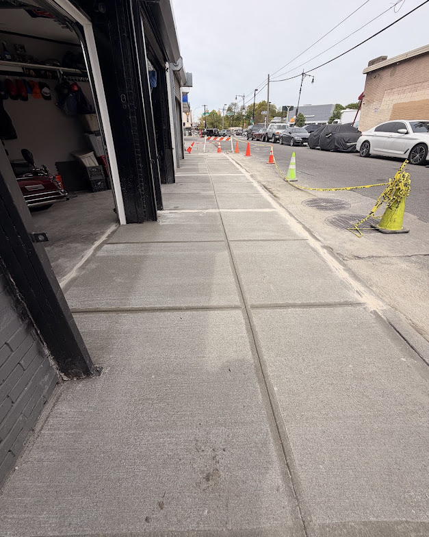 New commercial concrete sidewalk with clean expansion joints