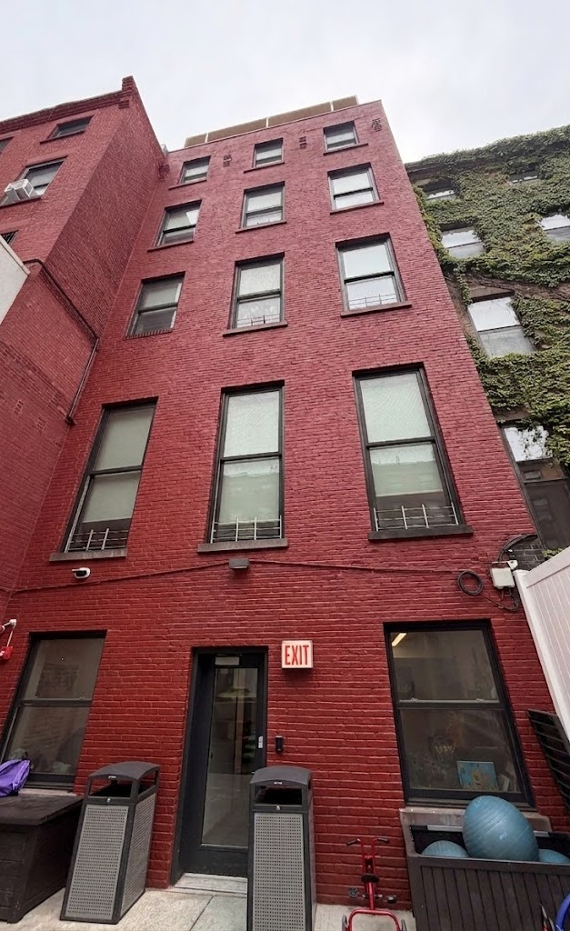 Multi-story red brick building facade and exterior