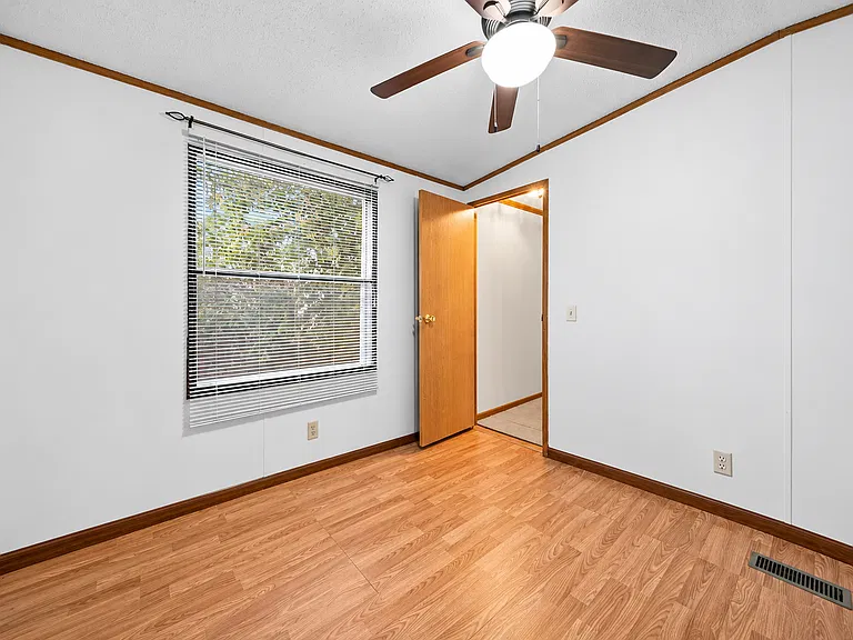 Bright Bedroom with Ceiling Fan