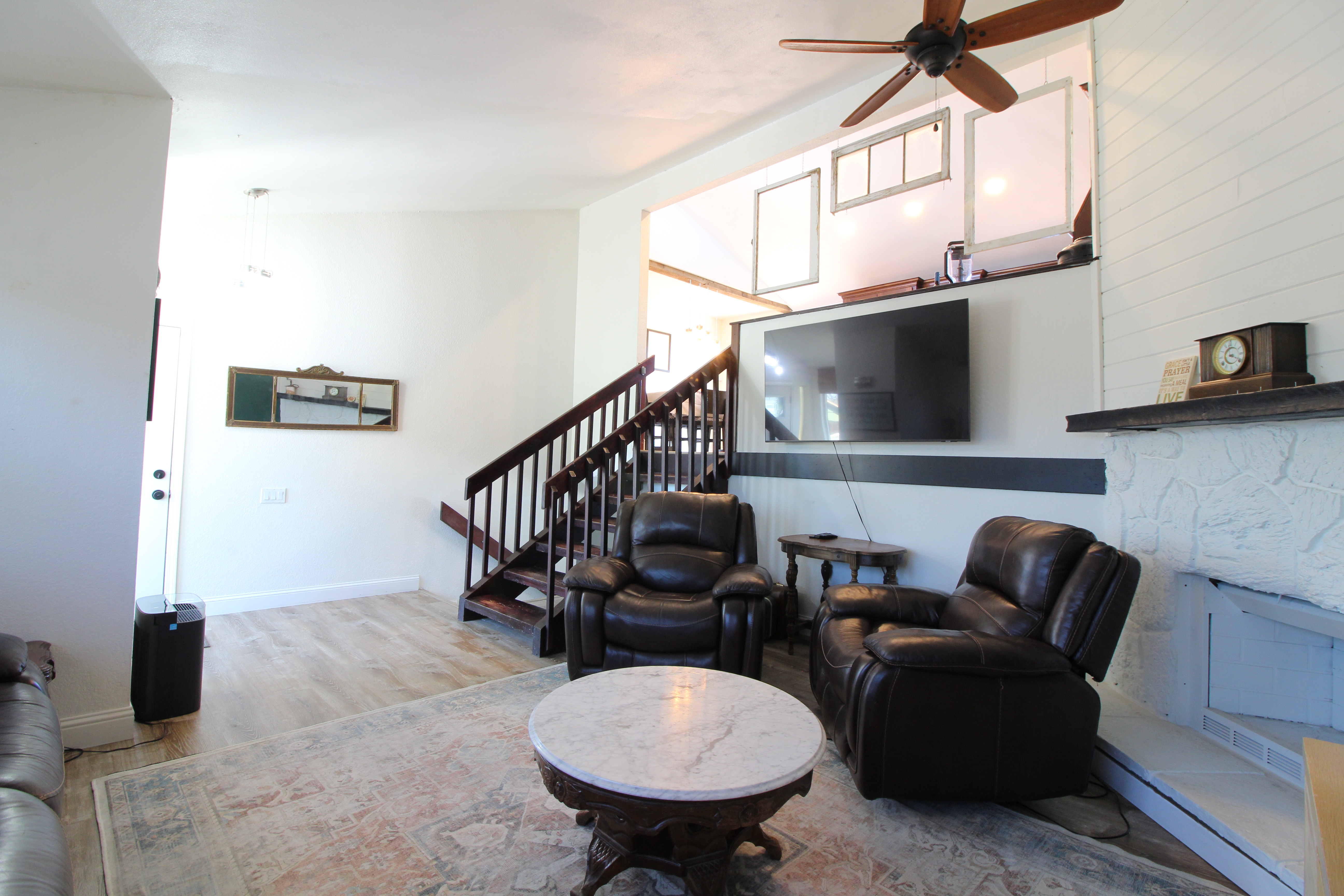 Vaulted Living Area & Stone Fireplace