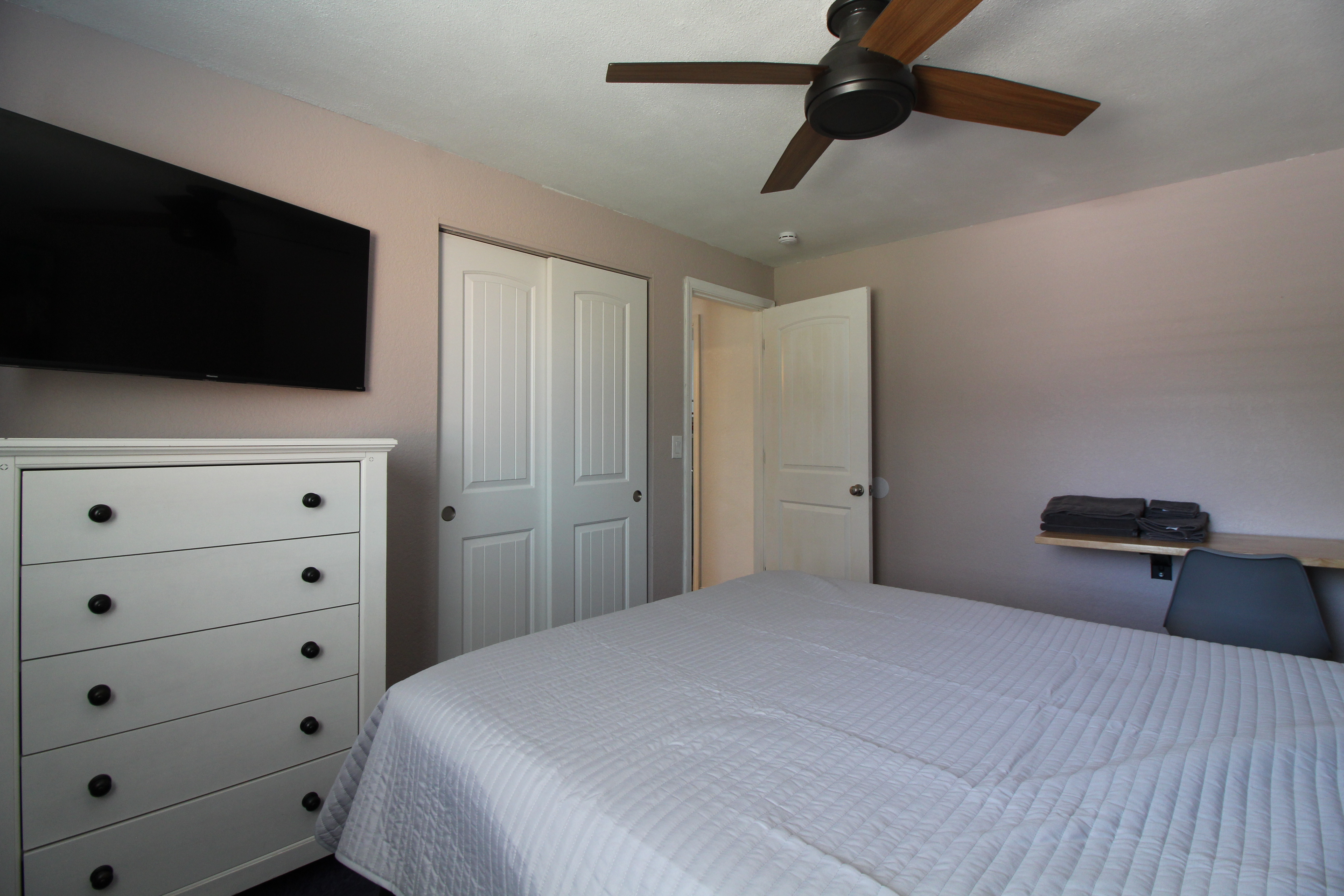 Full Bedroom Storage & Mounted TV