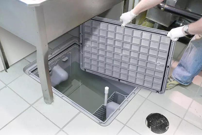 Commercial kitchen grease trap pumping and interceptor cleaning by All Counties Plumbing