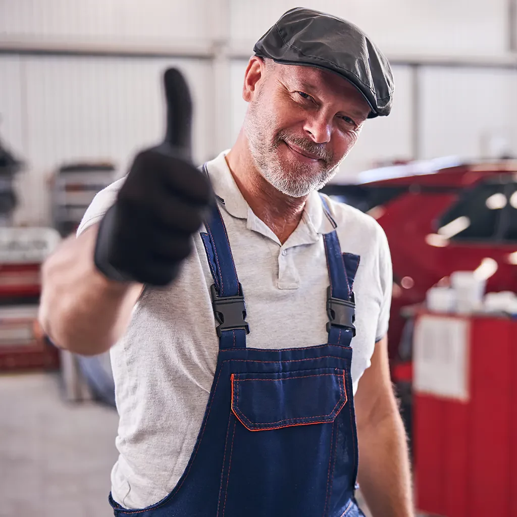 Happy business owner thumbs up