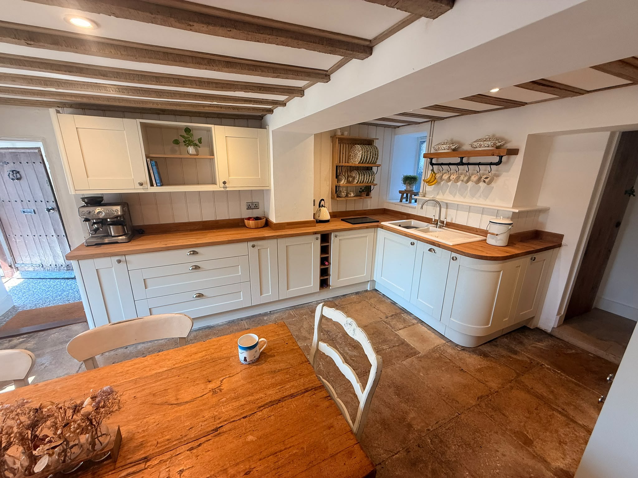 Bespoke fitted kitchen with curved cabinetry — Amesbury