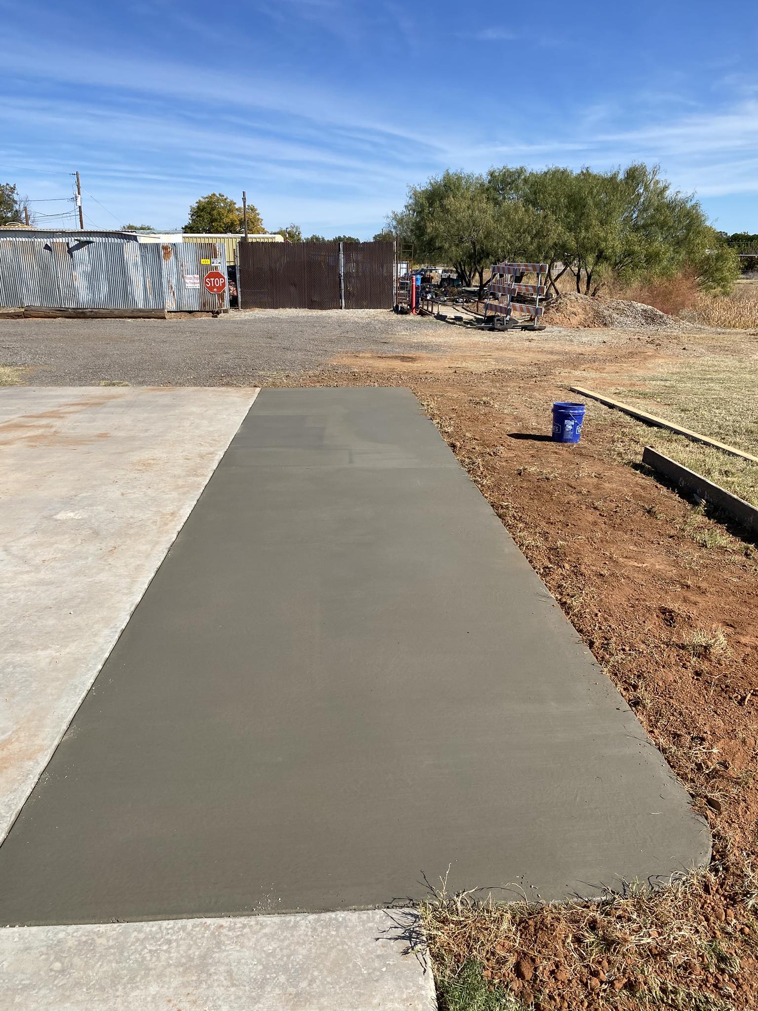 Outdoor living concrete patio extension in Henrietta, TX
