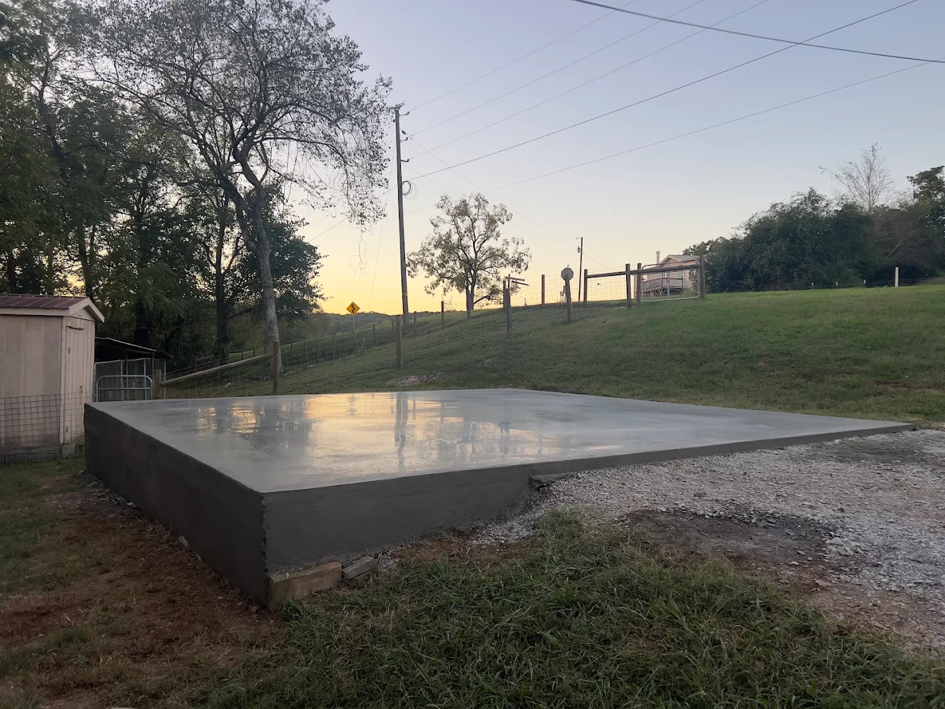 Prepared concrete pad and level site foundation.