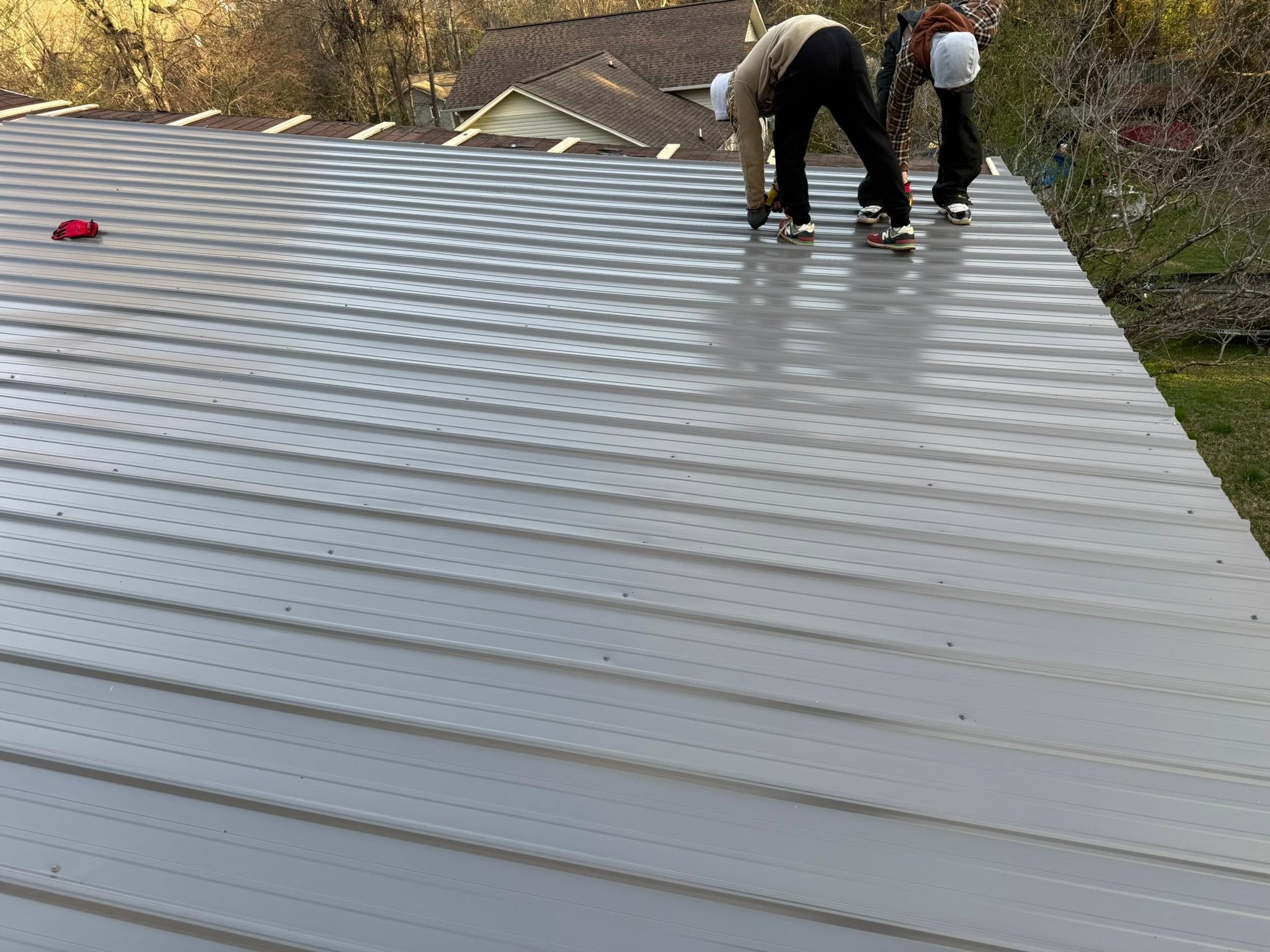 Roofing and exterior addition by Amen Brother Construction