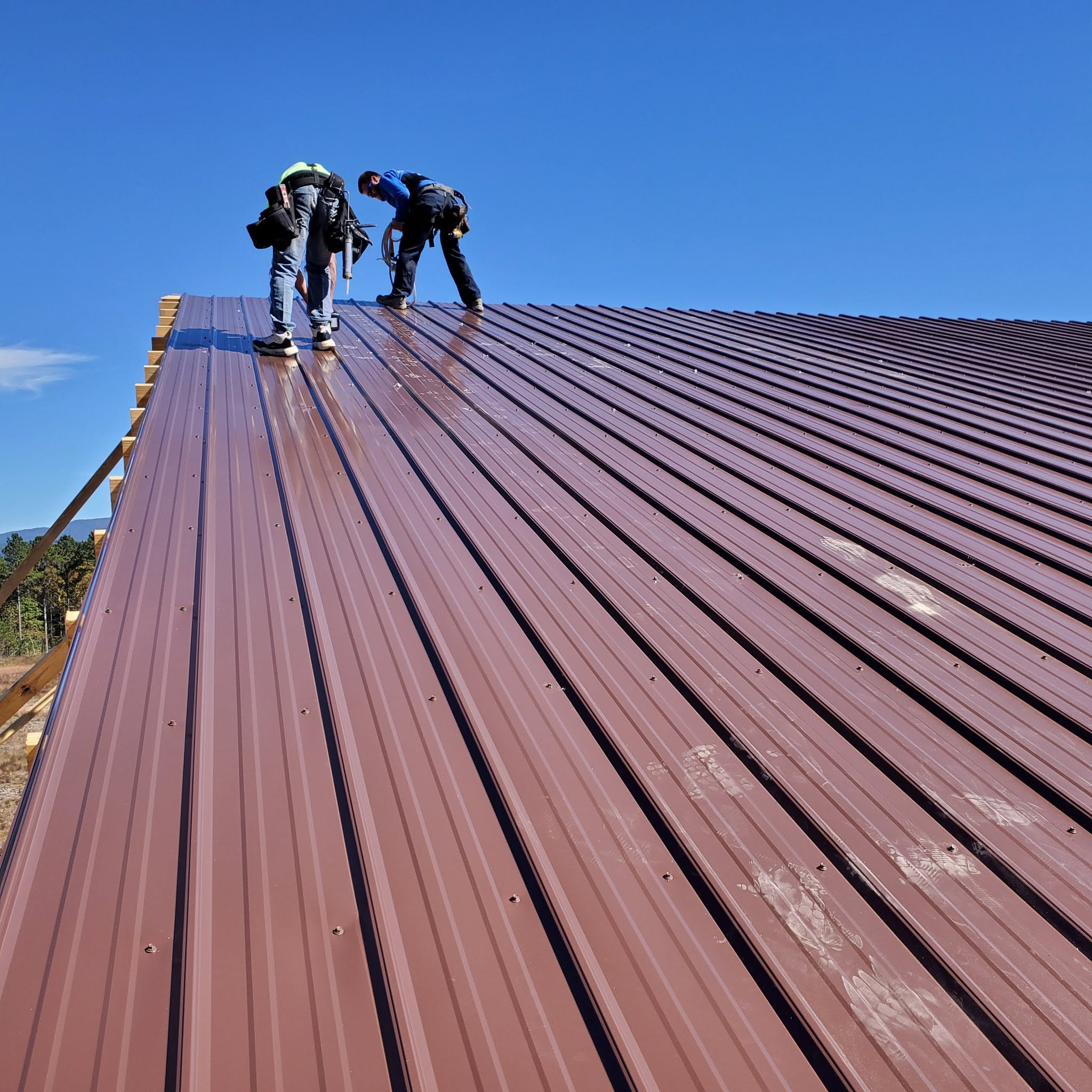 Metal roof installation completed by Amen Brother Construction