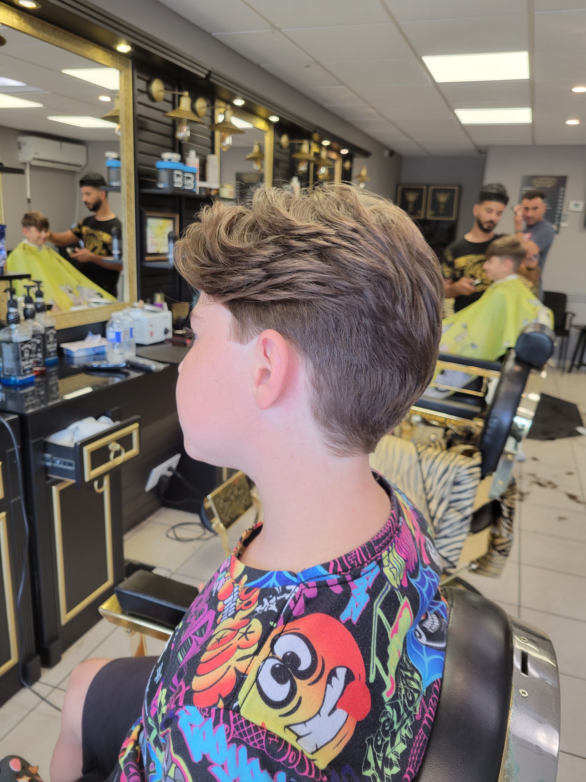 Textured flow haircut and clean taper for youth