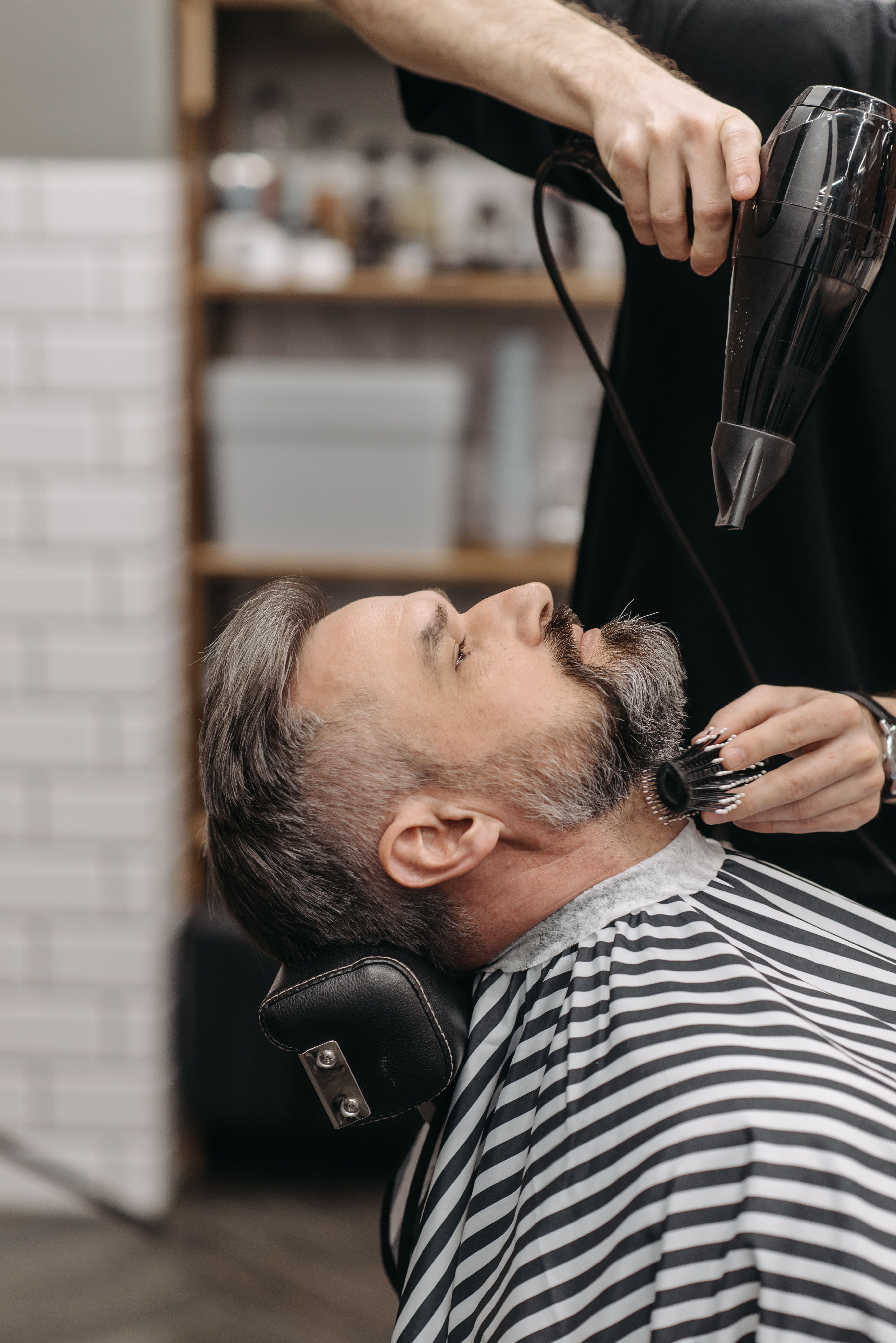 Beard styling, blow-dry and detailing in luxury chair