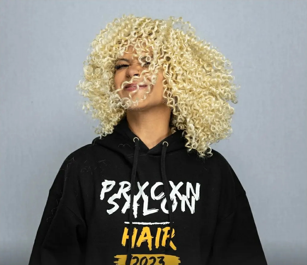 Vibrant blonde voluminous textured curls styled at La Salon in Pickering